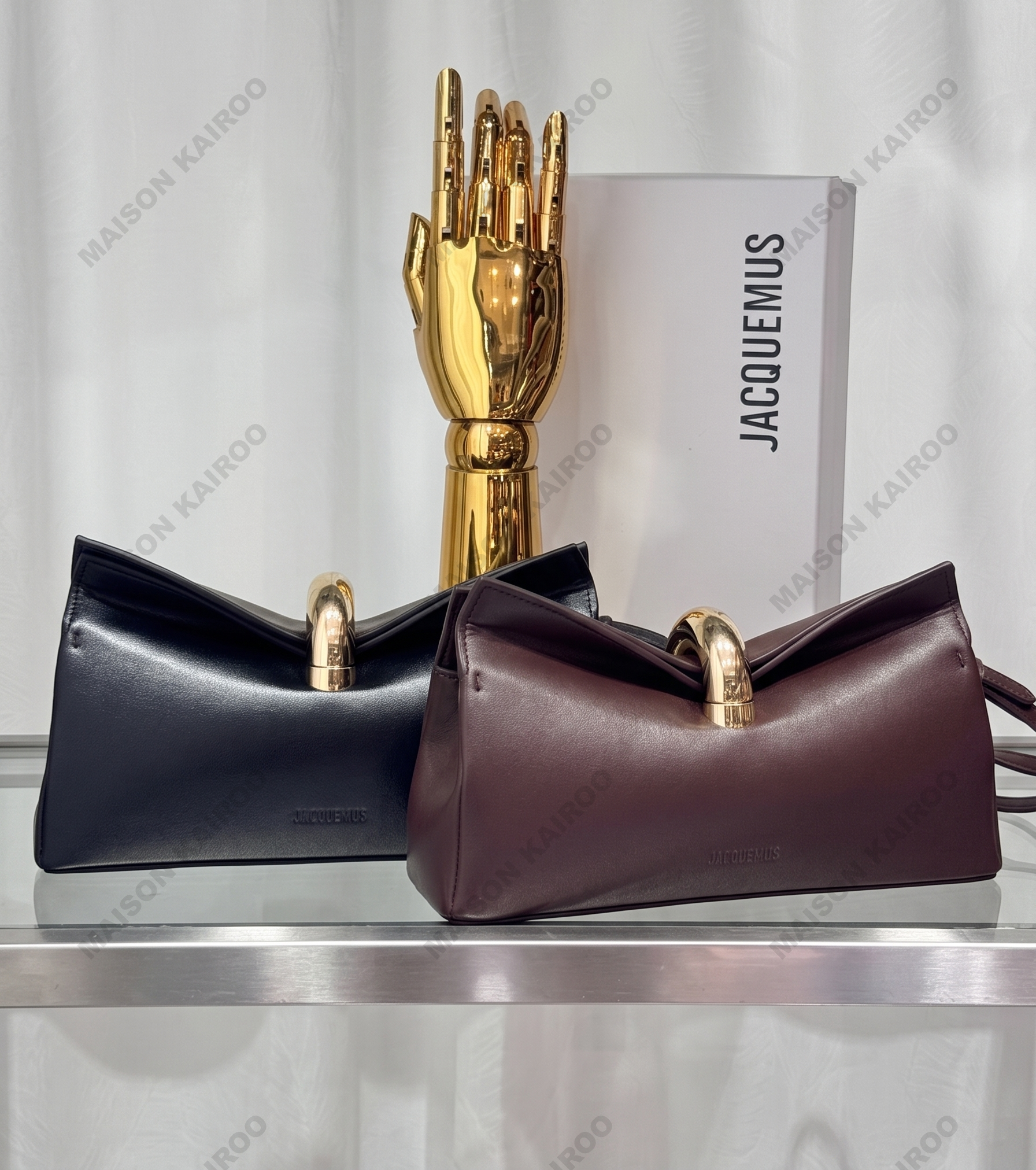 Jacquemus The Valérie Clutch East West Smooth Leather Ring Bar Metal Lock Wristlet Clutch Bag - KAIROO