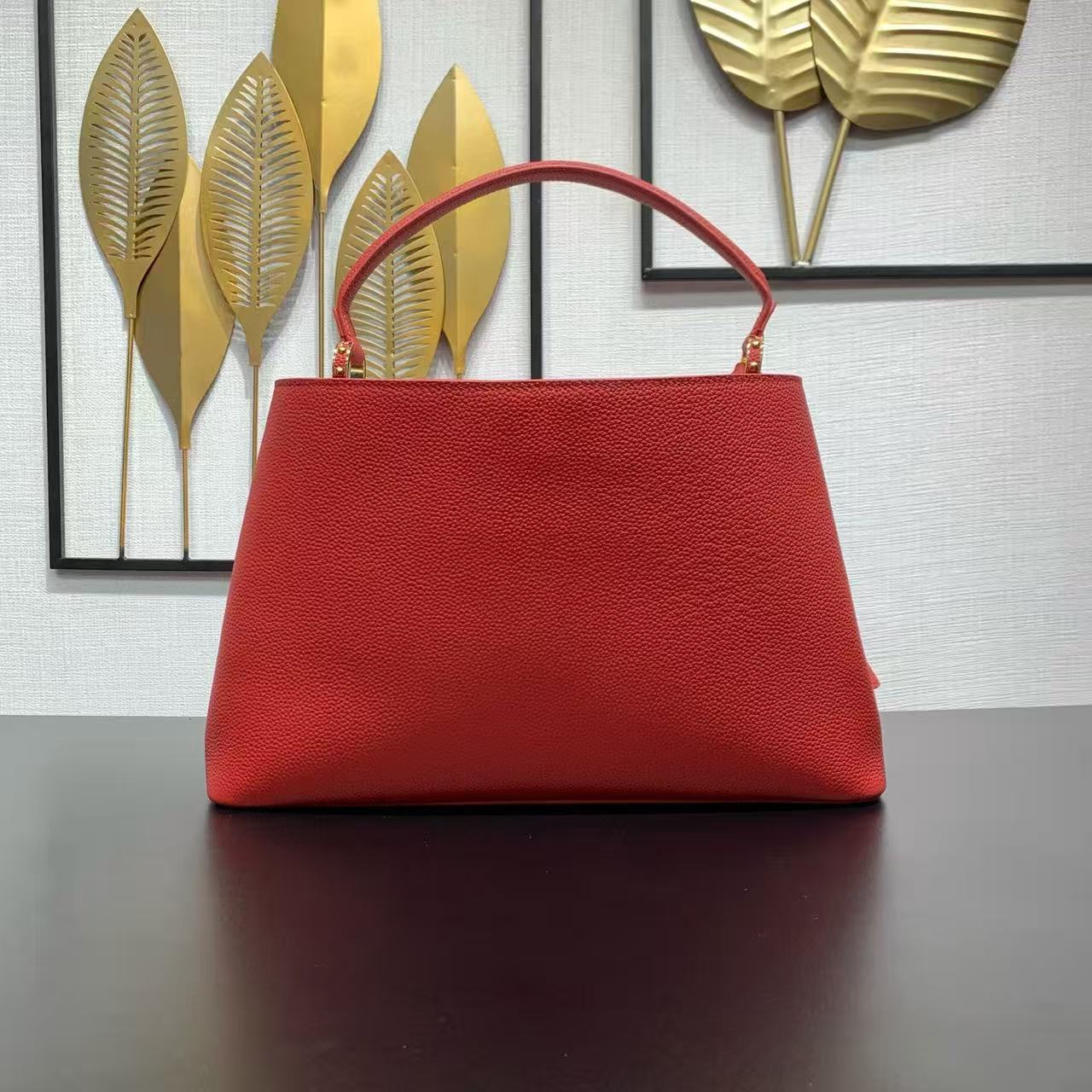 Louis Vuitton new Capucines handbag in red