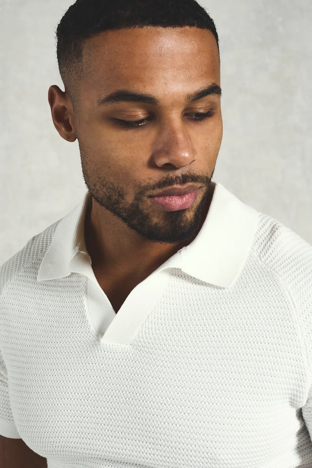 Textured Knitted Open Collar Polo Shirt in Off White