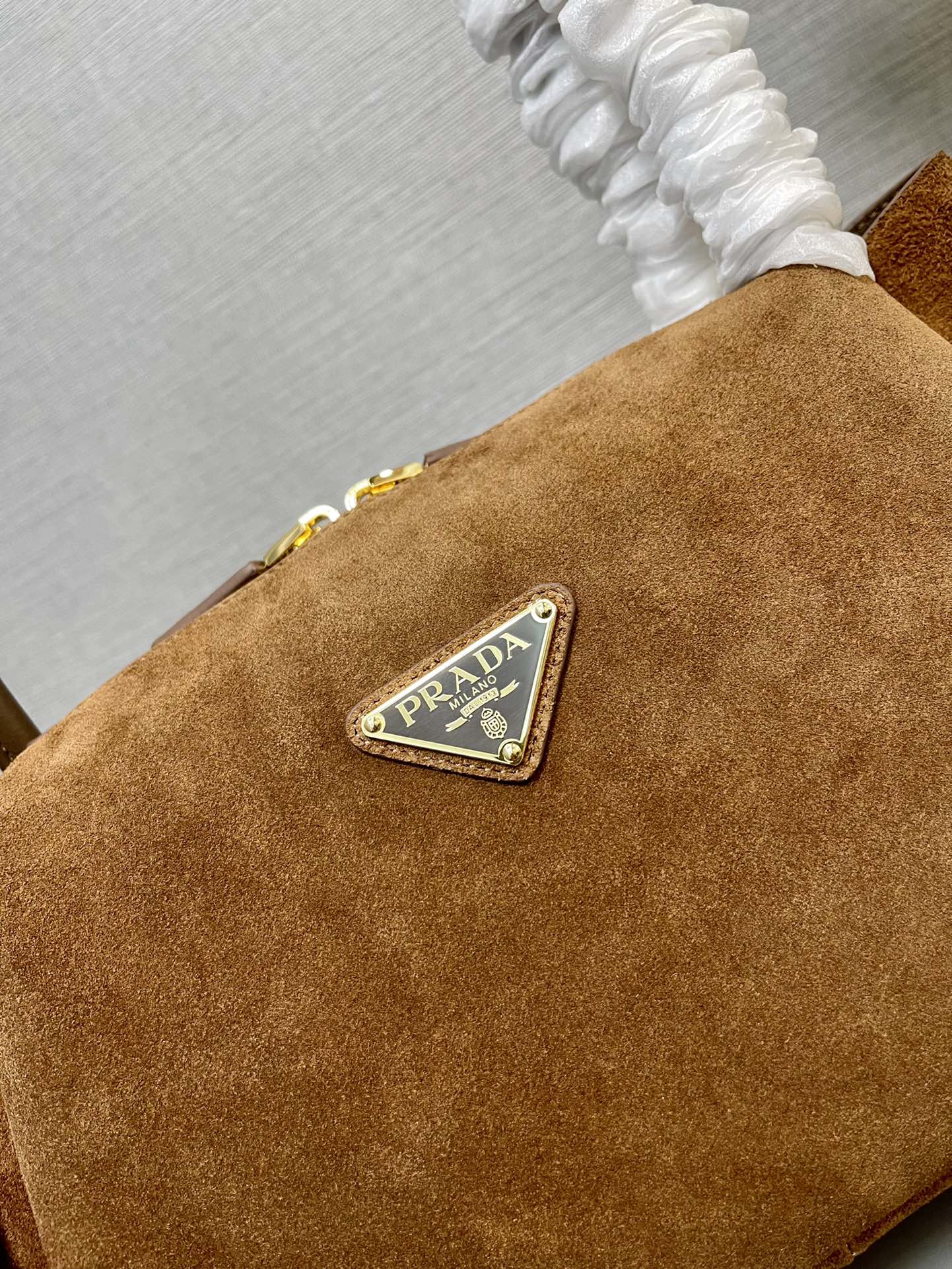 Prada SHOULDER BAG 28 IN TAWNY BROWN SUEDE GOLD LOGO