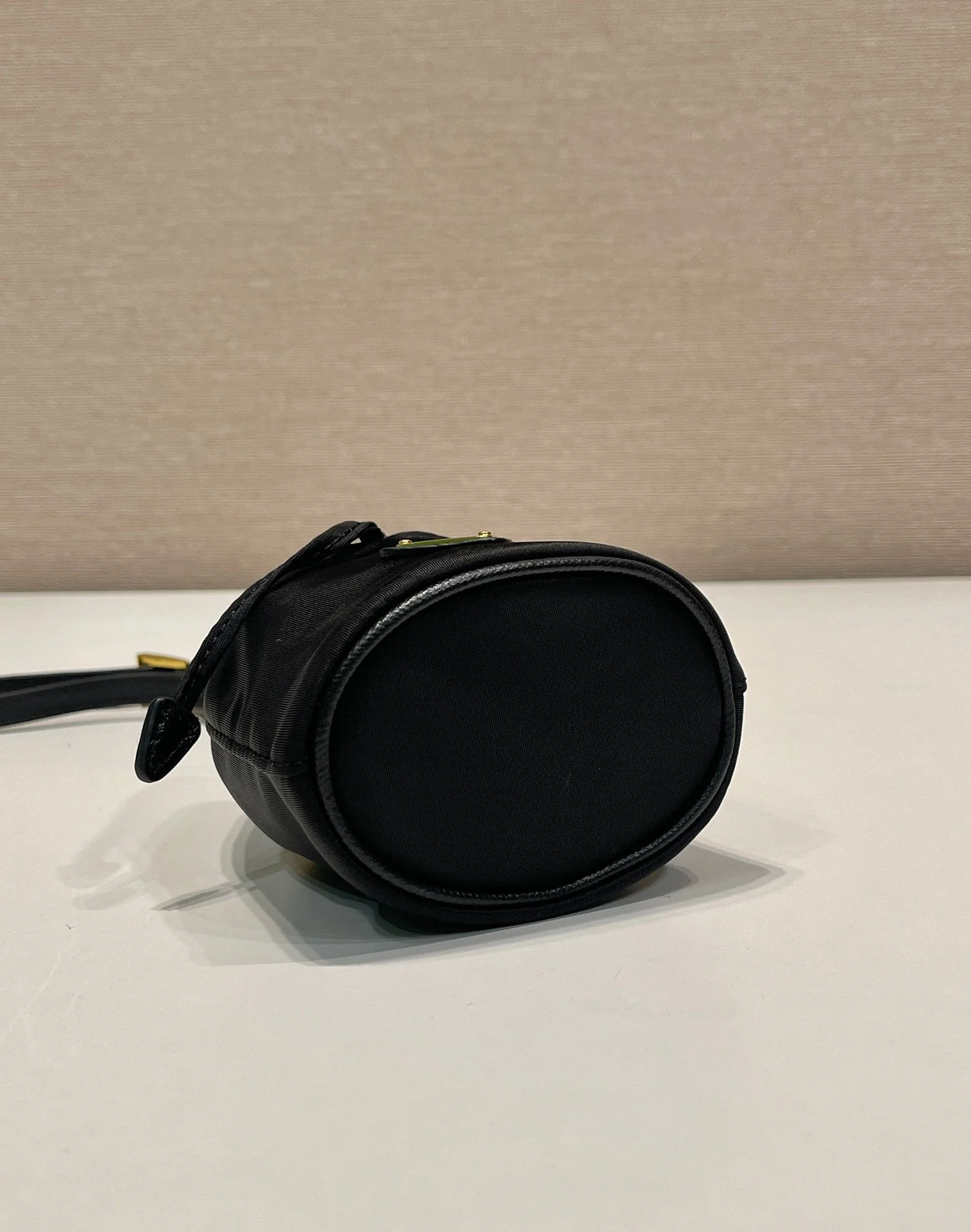 Prada MINI BUCKET BAG 10 IN BLACK RE-NYLON AND SAFFIANO LEATHER STRAP