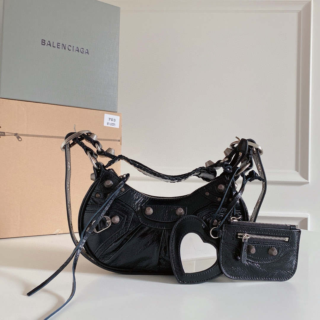 𝐁alenciaga Le Cagole XS Shoulder Bag in Black Leather
