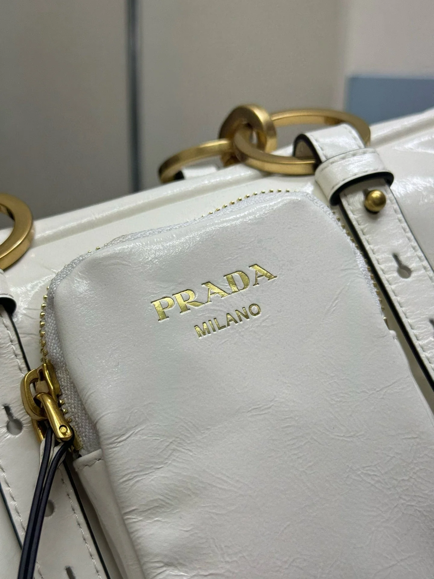 Prada DANGLE TOP HANDLE BAG 30 IN WHITE PATENT CALFSKIN