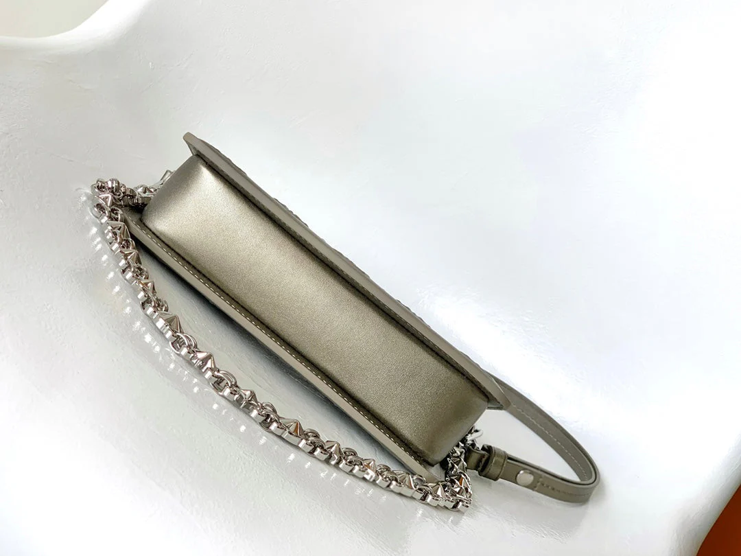 Louis Vuitton LV Lexington Pochette Shoulder Bag 21.5 Metallic Sliver Monogram Embossed Cafskin