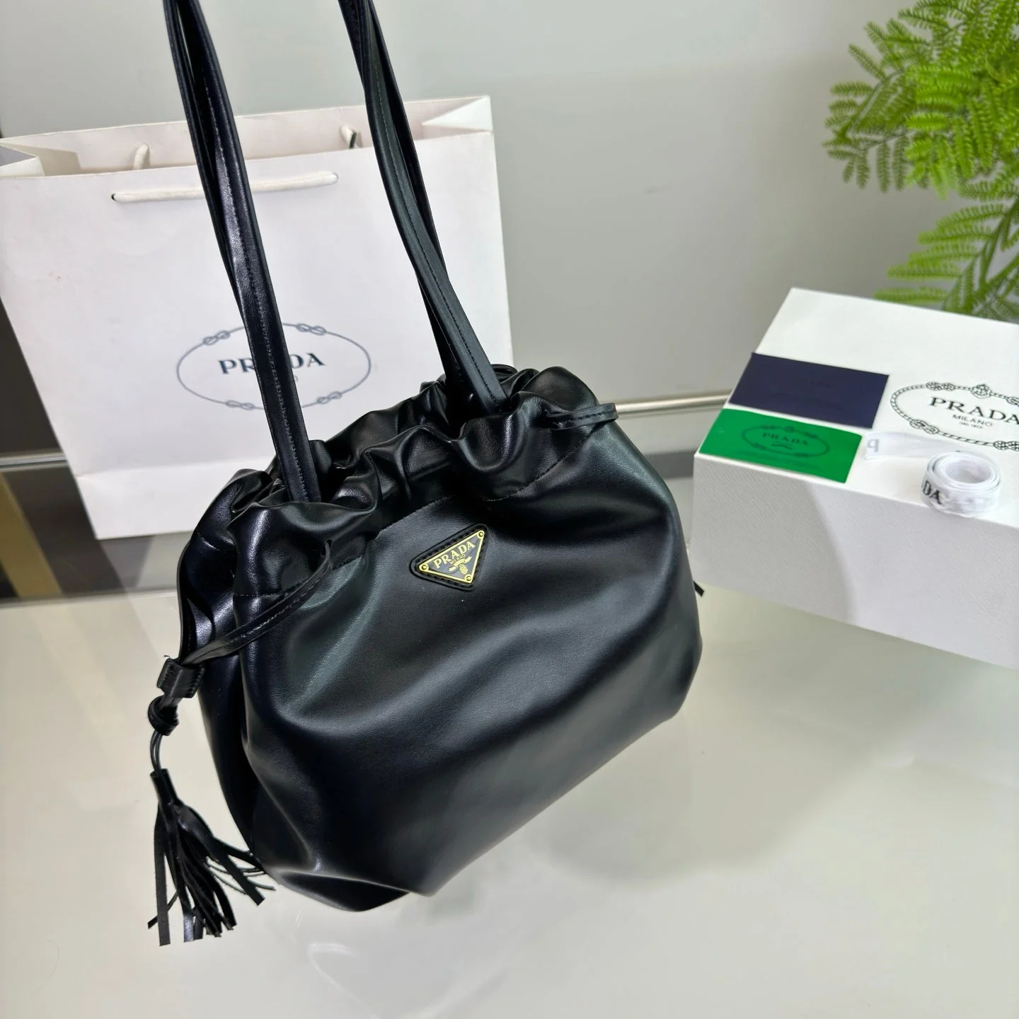 Prada DRAWSTRING BUCKET BAG 25 IN BLACK SOFT LAMBSKIN