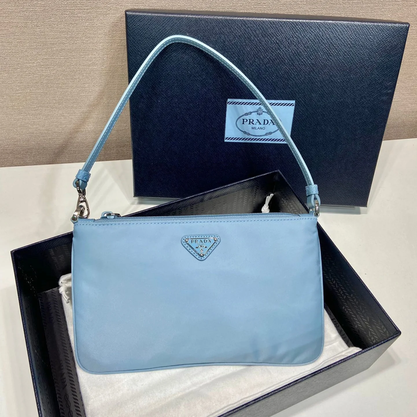 Prada SHOULDER BAG 24 WITH TRIANGLE LOGO IN SKY BLUE RE-NYLON FABRIC