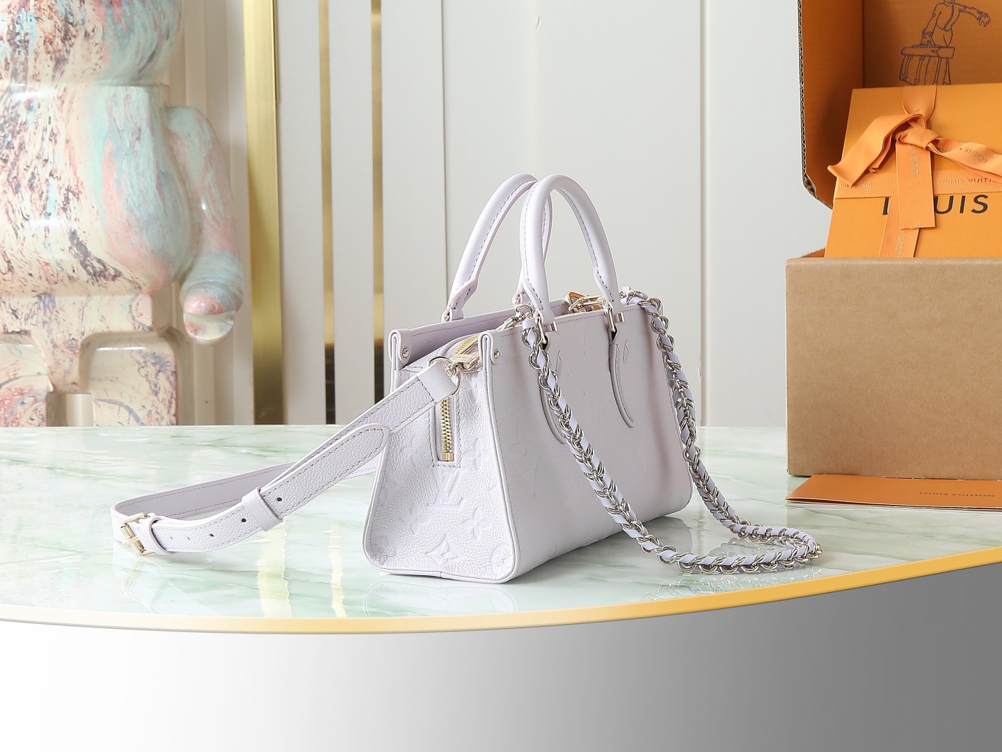 Louis Vuitton LV TM ONTHEGO EAST WEST CHAIN ​​White