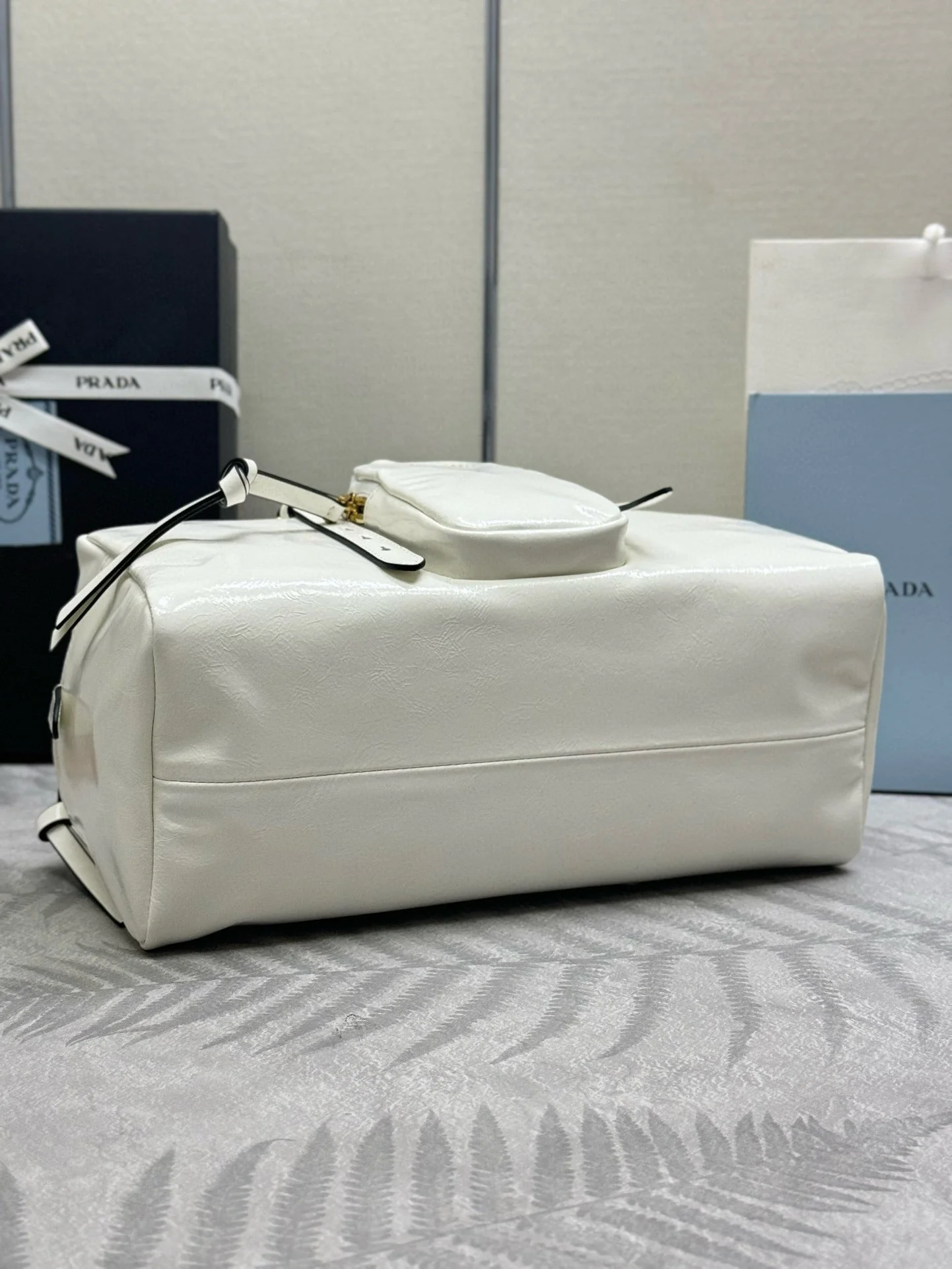 Prada DANGLE TOP HANDLE BAG 30 IN WHITE PATENT CALFSKIN