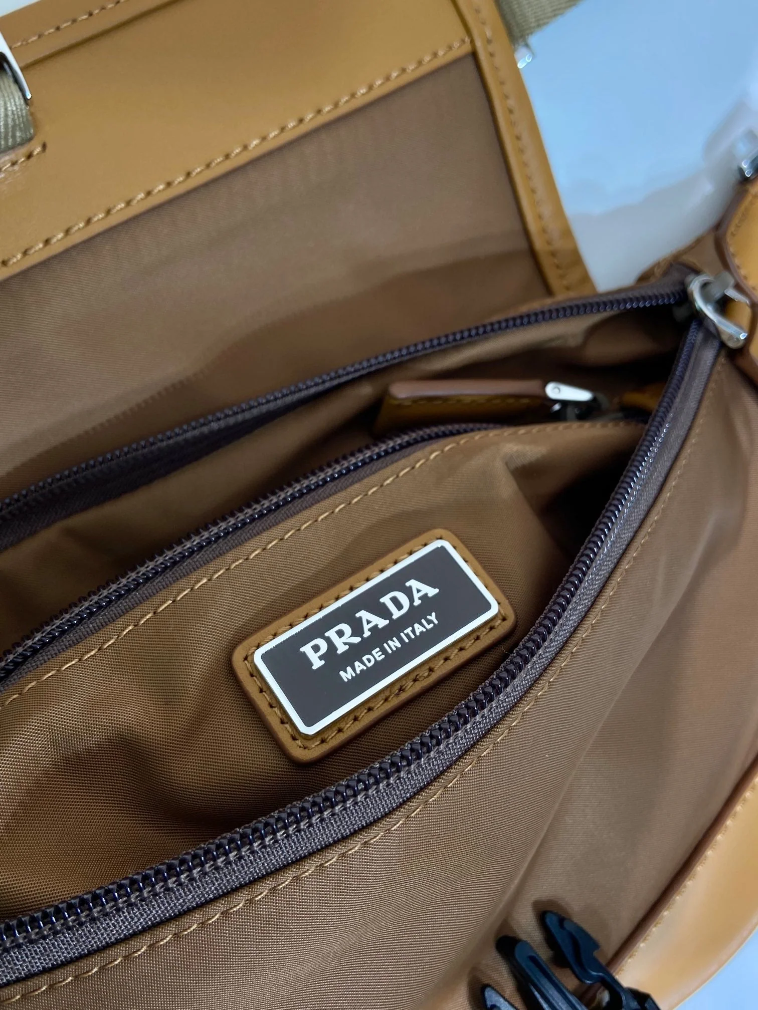 Prada BAG 18 IN SEPIA BROWN RE-NYLON AND CALFSKIN TRIM