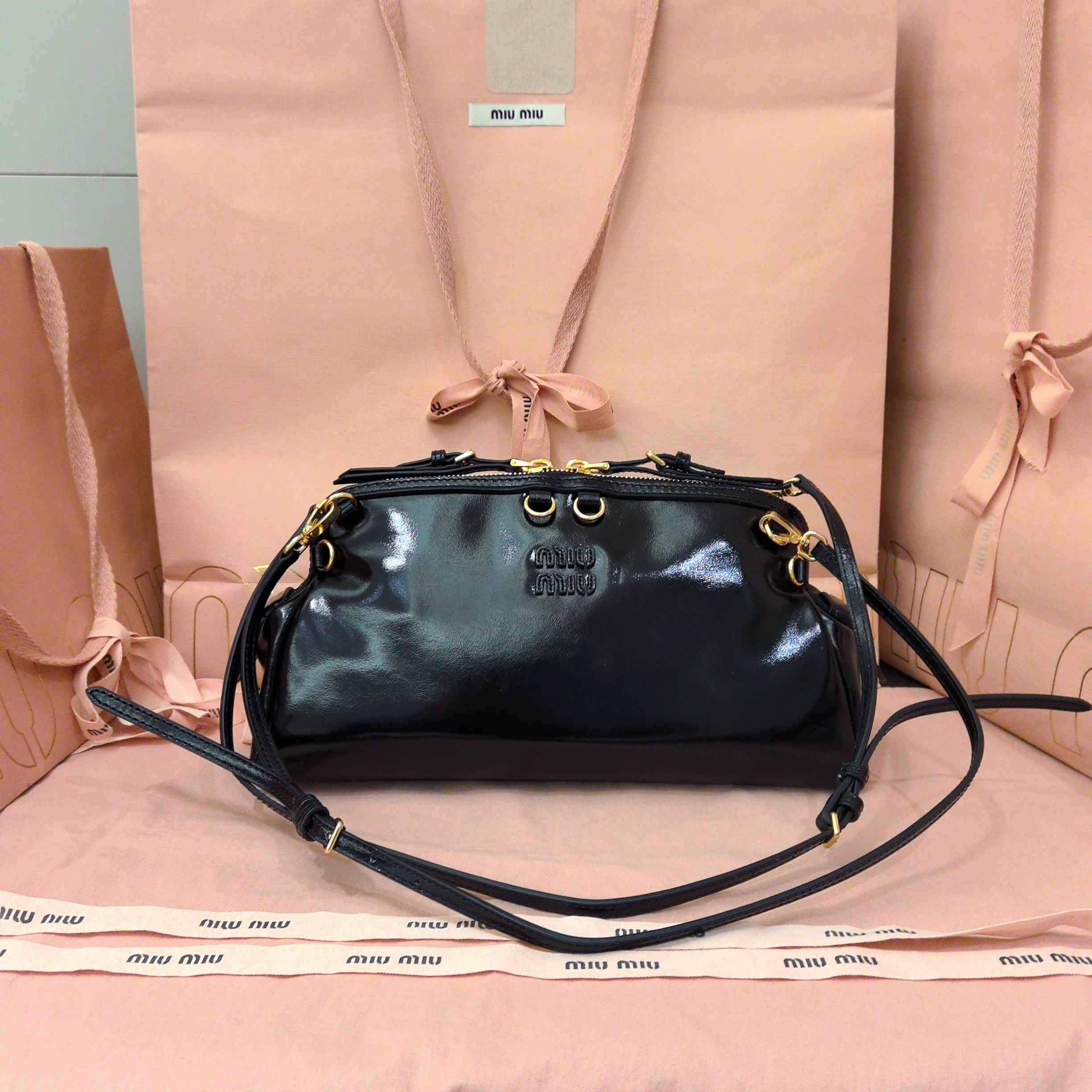 Miu Miu Black Caprice shiny leather clutch 5BF130