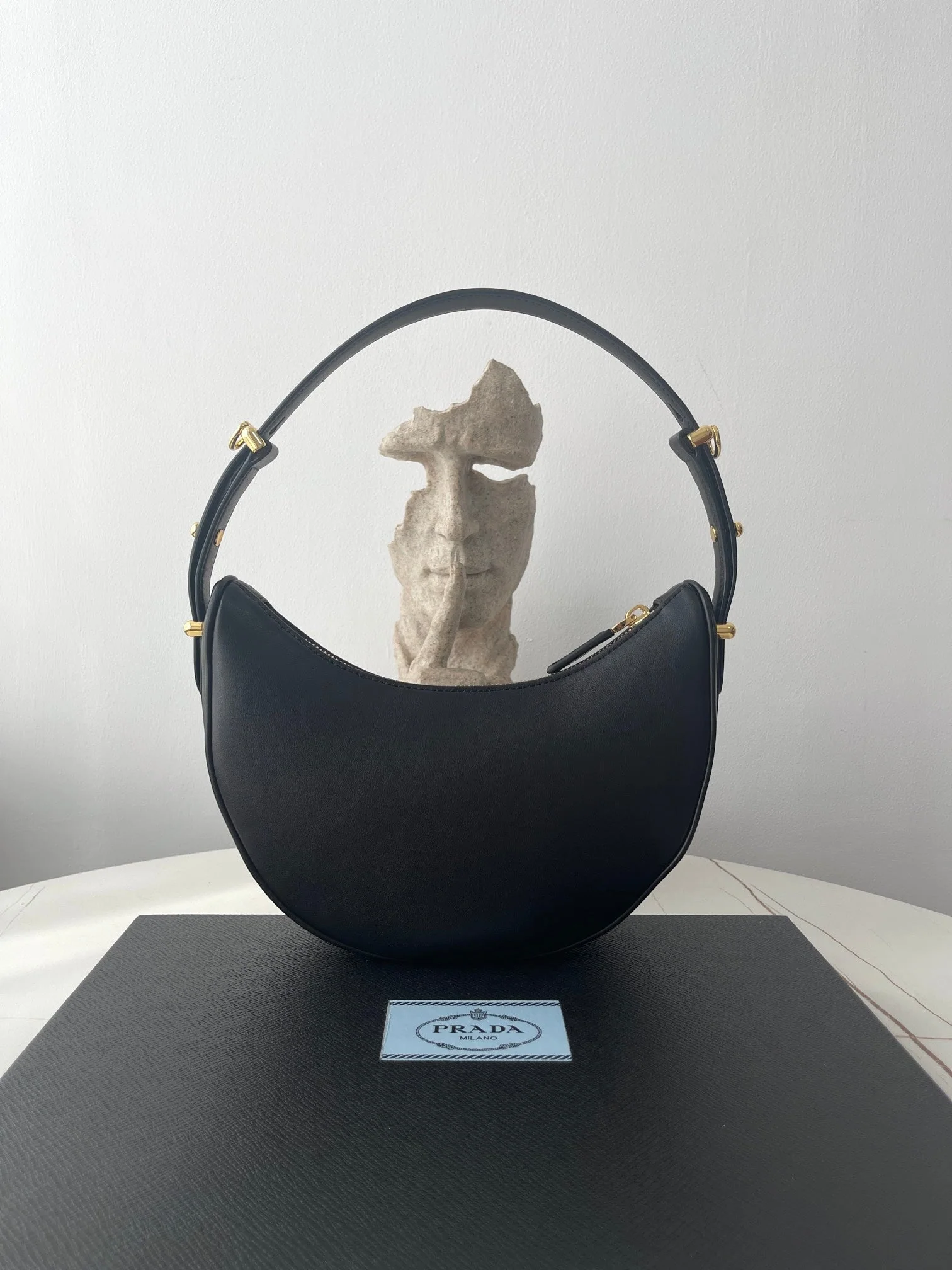 Prada ARQUÉ 22 SHOULDER BAG IN BLACK LEATHER