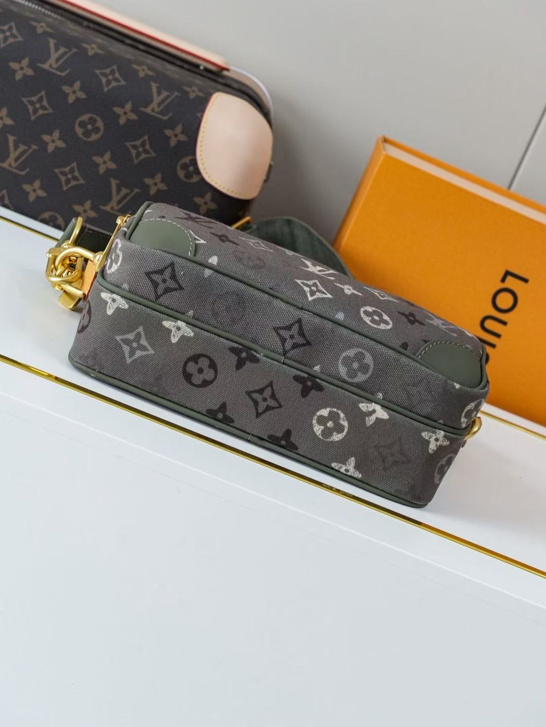 Louis Vuitton LV Monogram Surplus coated canvas bag
