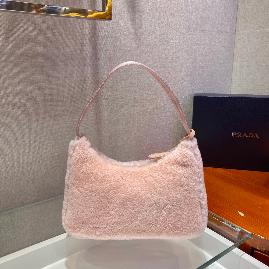 Prada HOBO BAG 23 IN LIGHT PINK SHEARLING