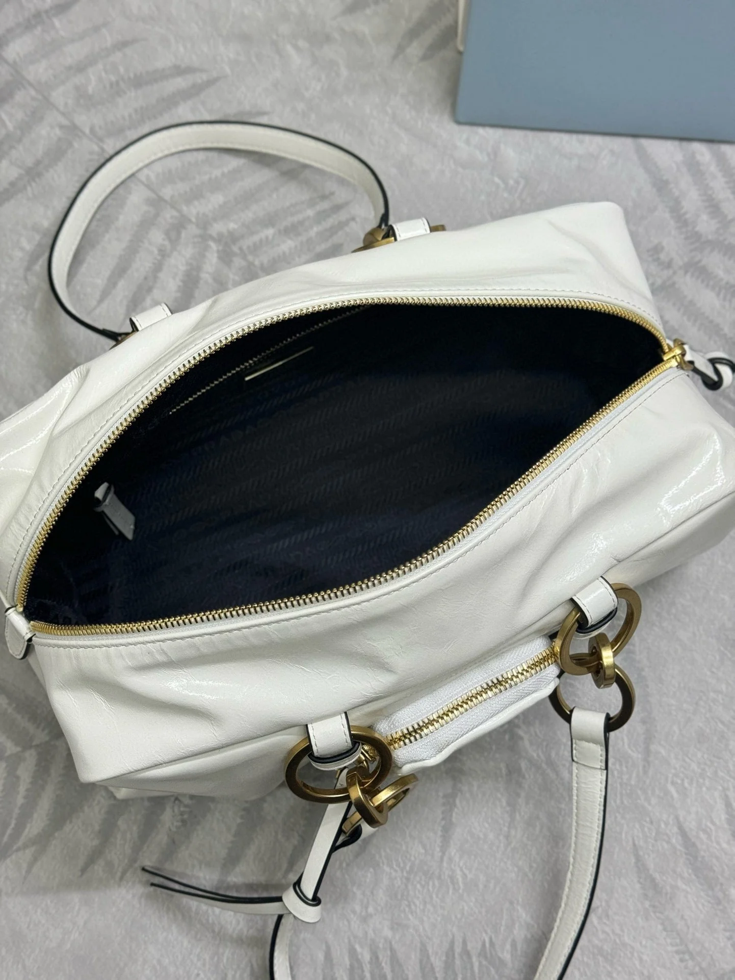 Prada DANGLE TOP HANDLE BAG 30 IN WHITE PATENT CALFSKIN