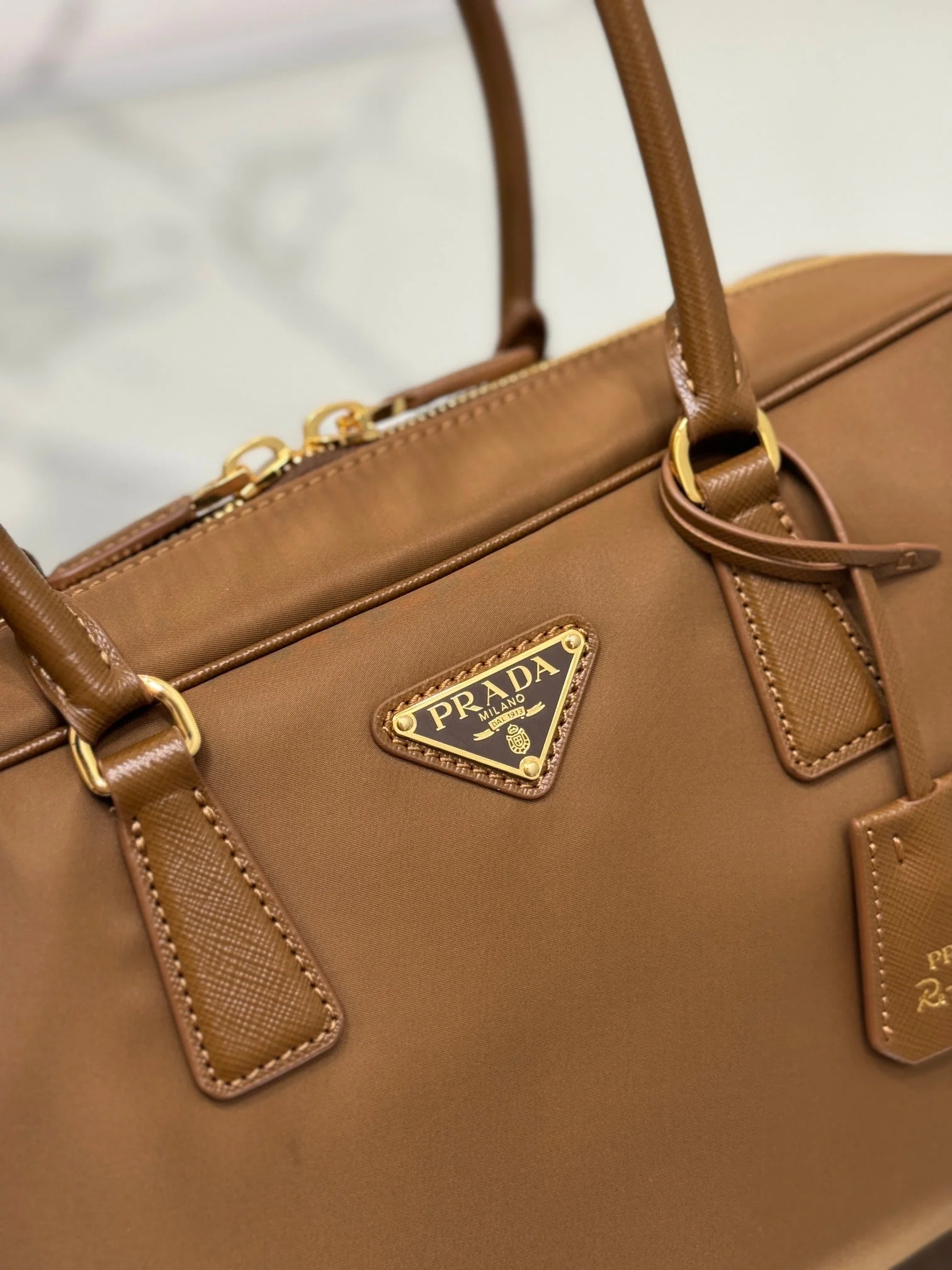 Prada LARGE TOP HANDLE BAG 35 IN CHERRY WOOD NYLON AND CALFSKIN TRIM