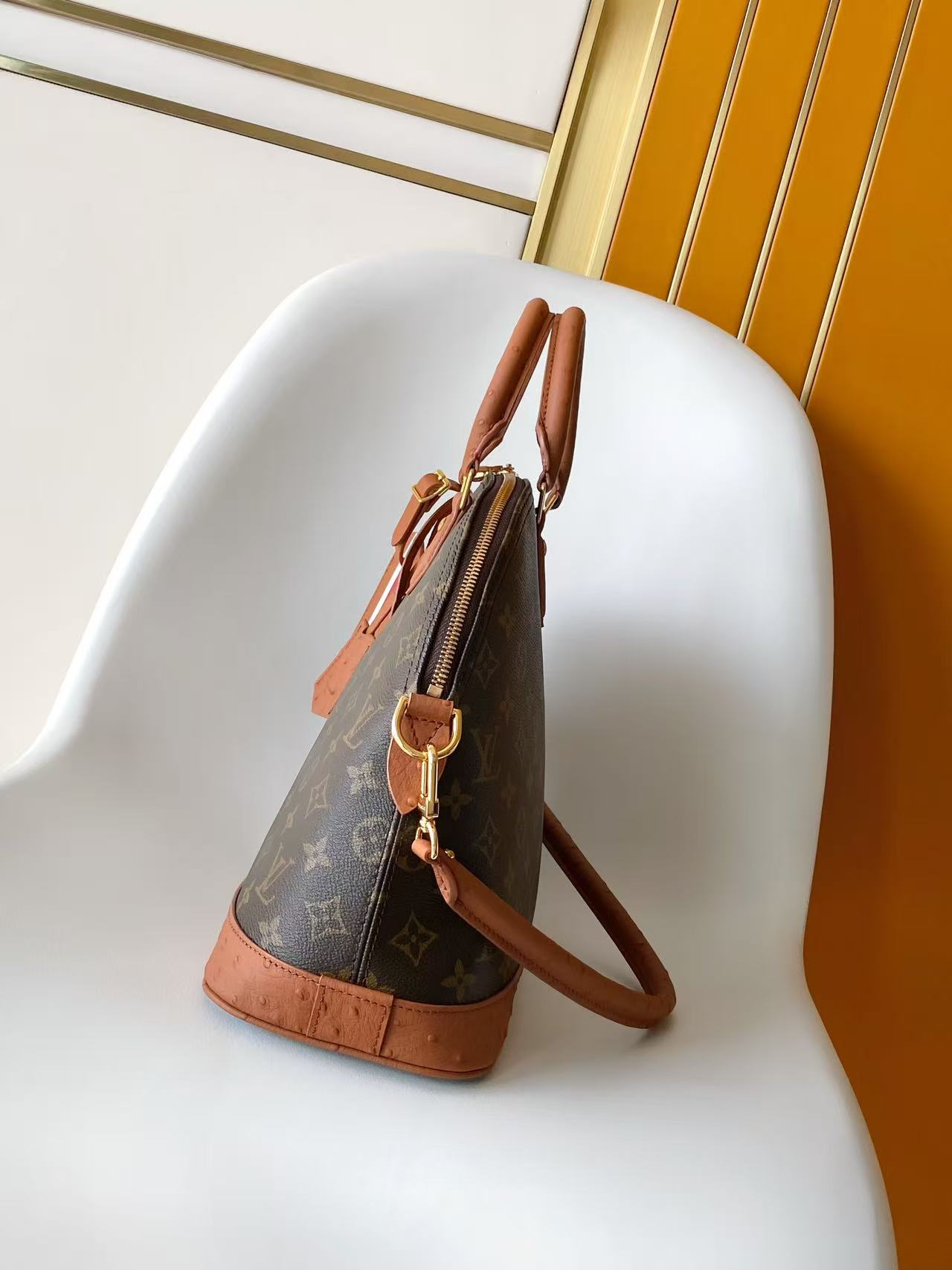 Louis Vuitton Monogram Pattern Alma Medium Handbag
