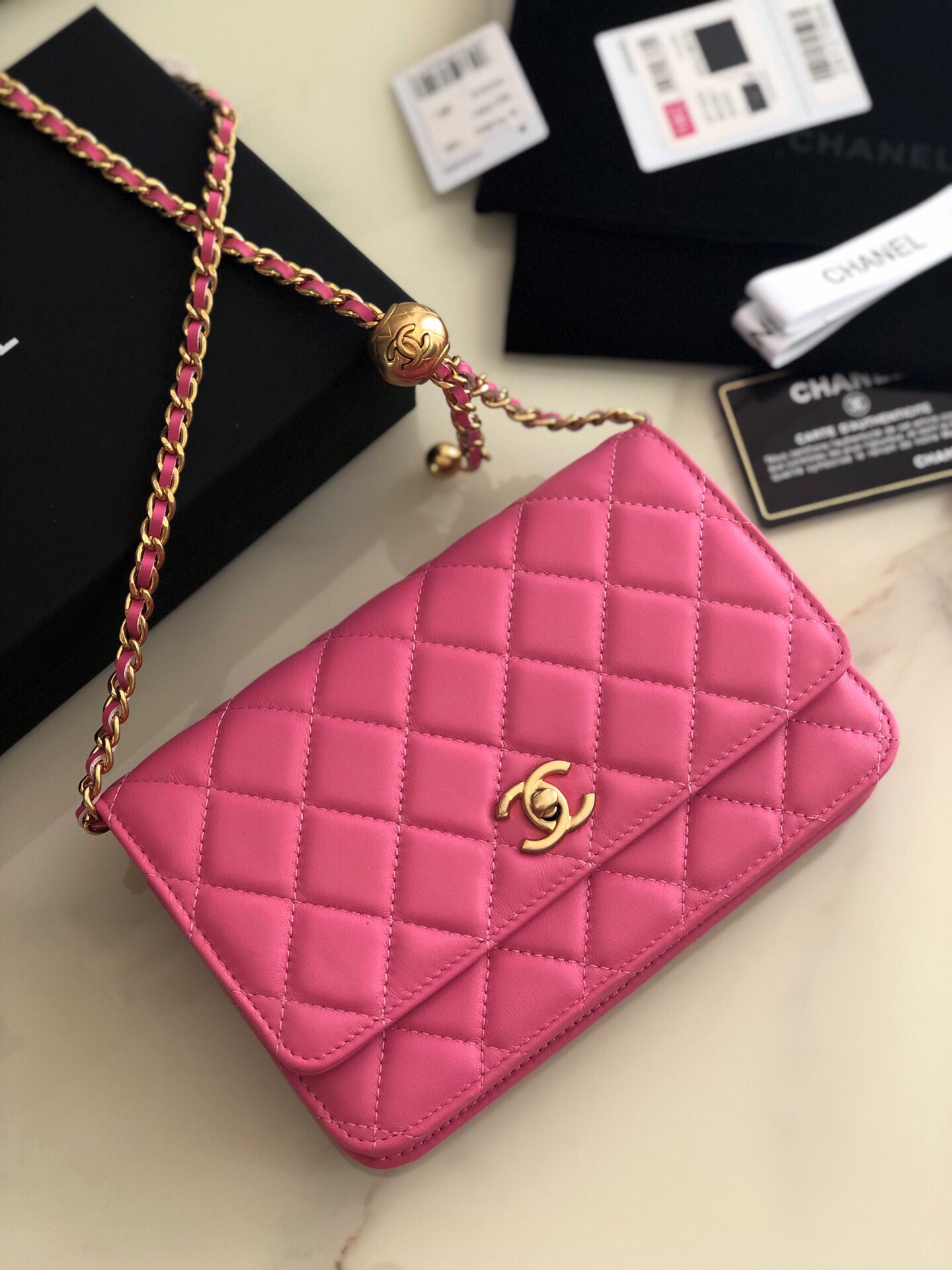 Chanel little golden ball woc