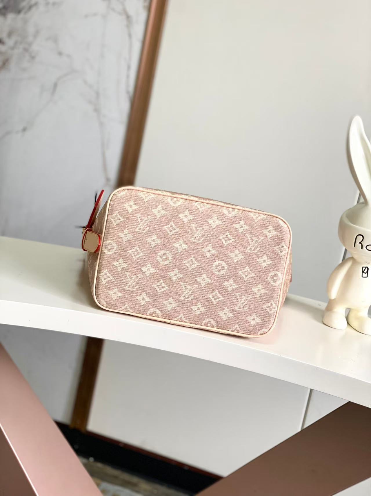 Louis Vuitton Travels With series bucket bags