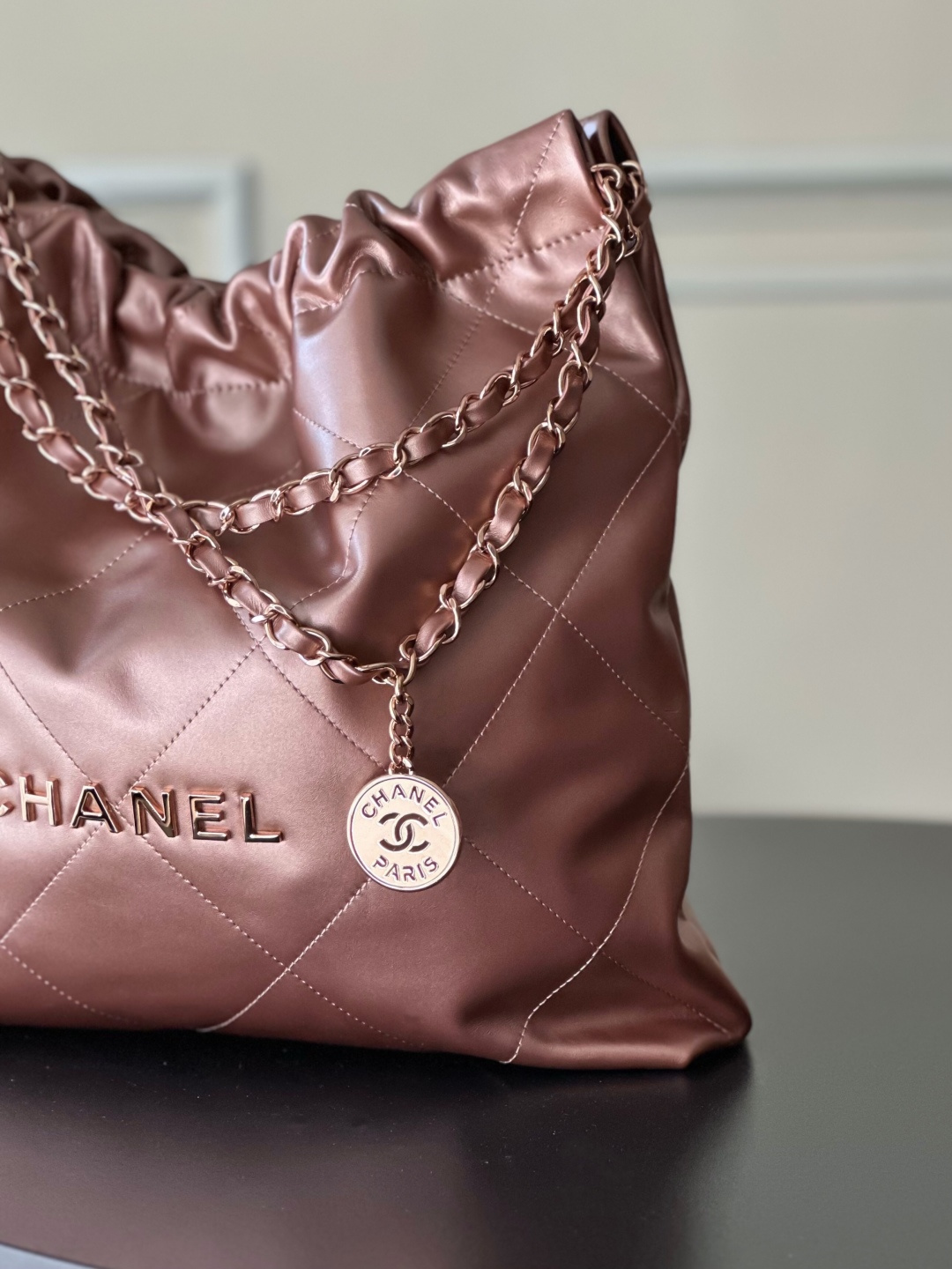 Chanel 22 Medium Handbag in Pink Gold Shiny Calfskin  AS3261