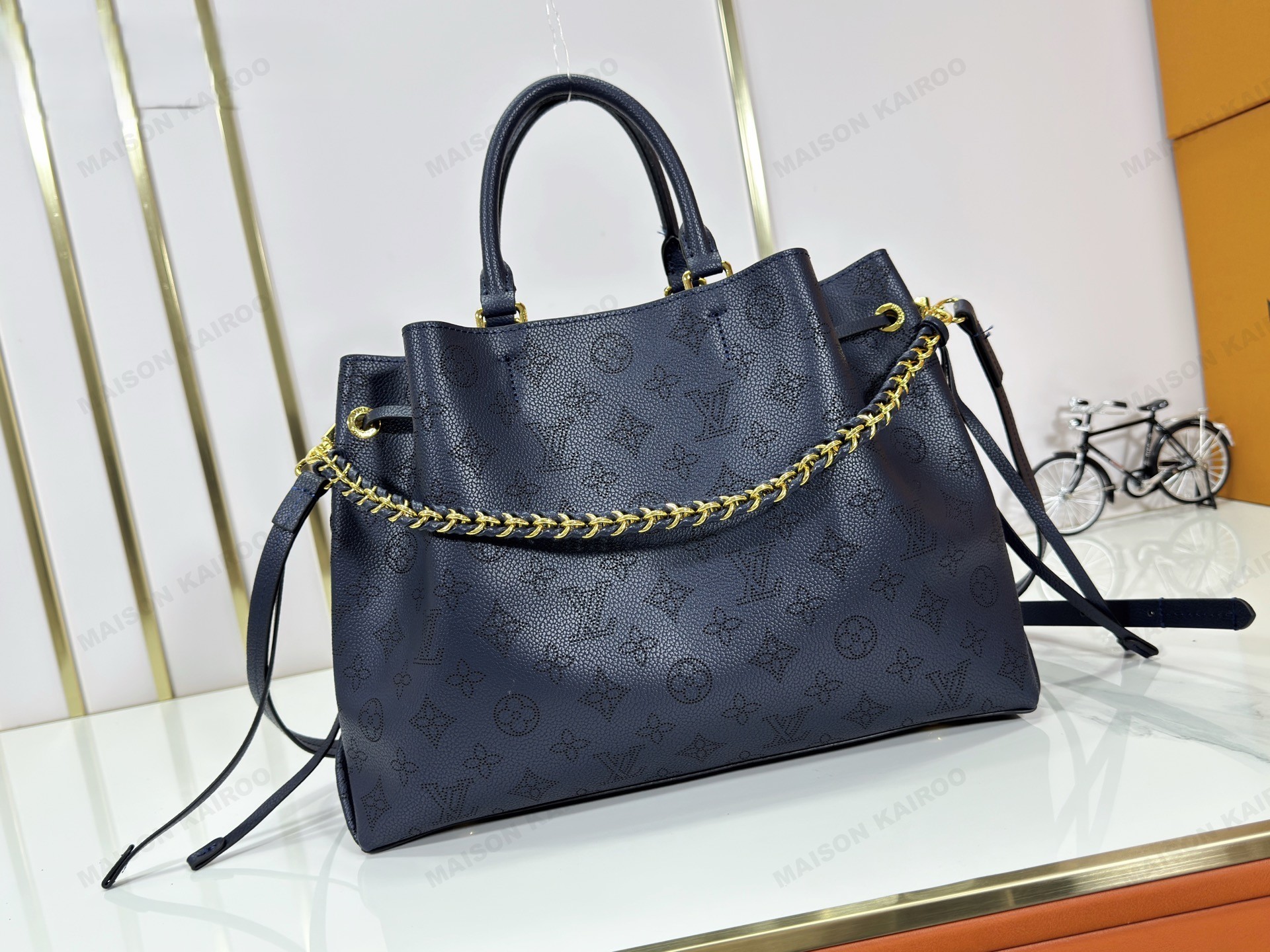 Louis Vuitton LV Mahina Bella Tote Navy Perforated Monogram Leather Drawstring Bucket Top Handle Bag - KAIROO