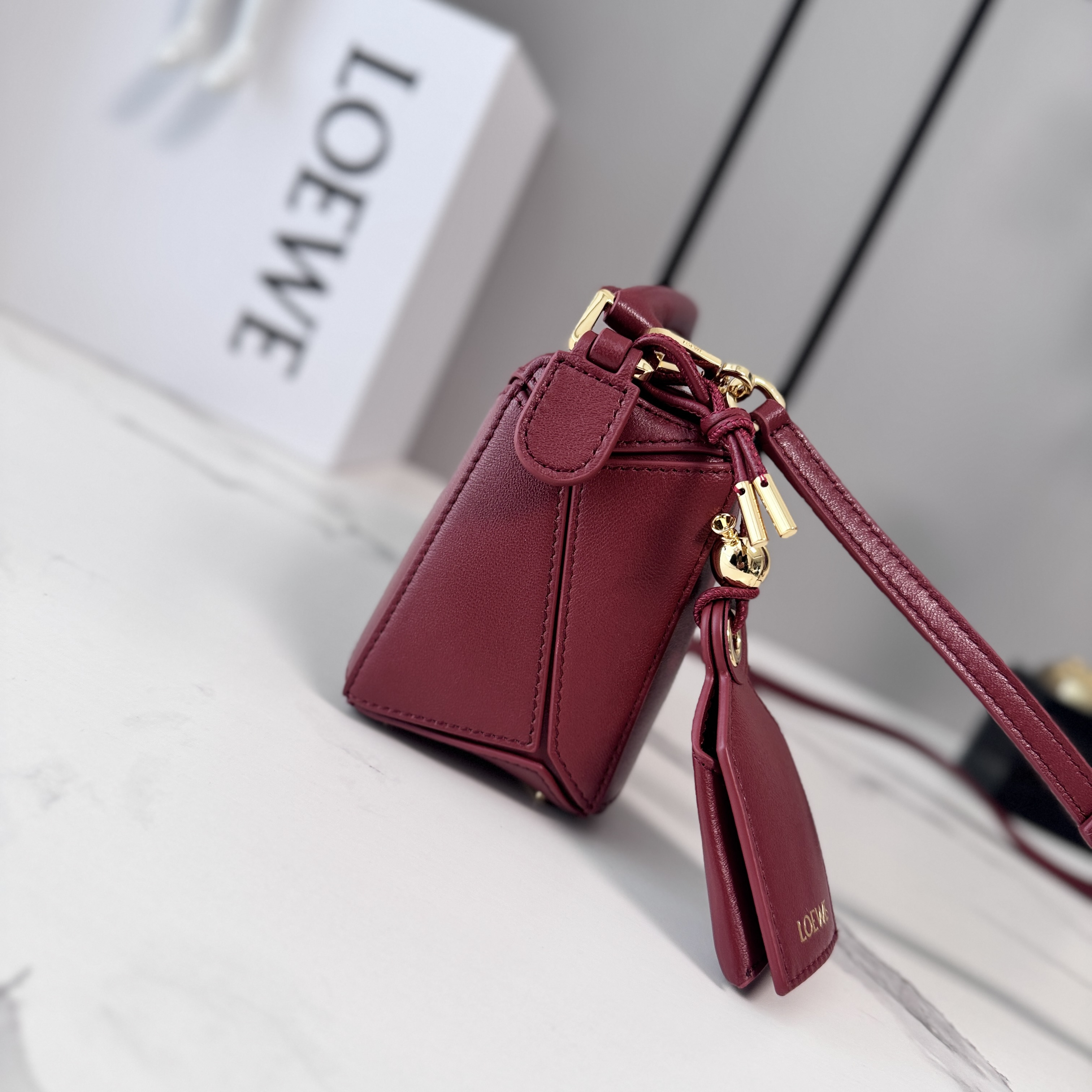 Loewe Mini Featherlight Puzzle bag in nappa lambskin-Rouge