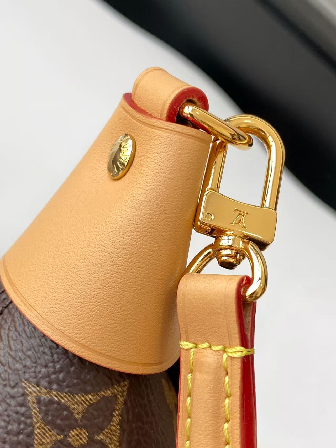 Louis Vuitton Pochette Mia Handbag