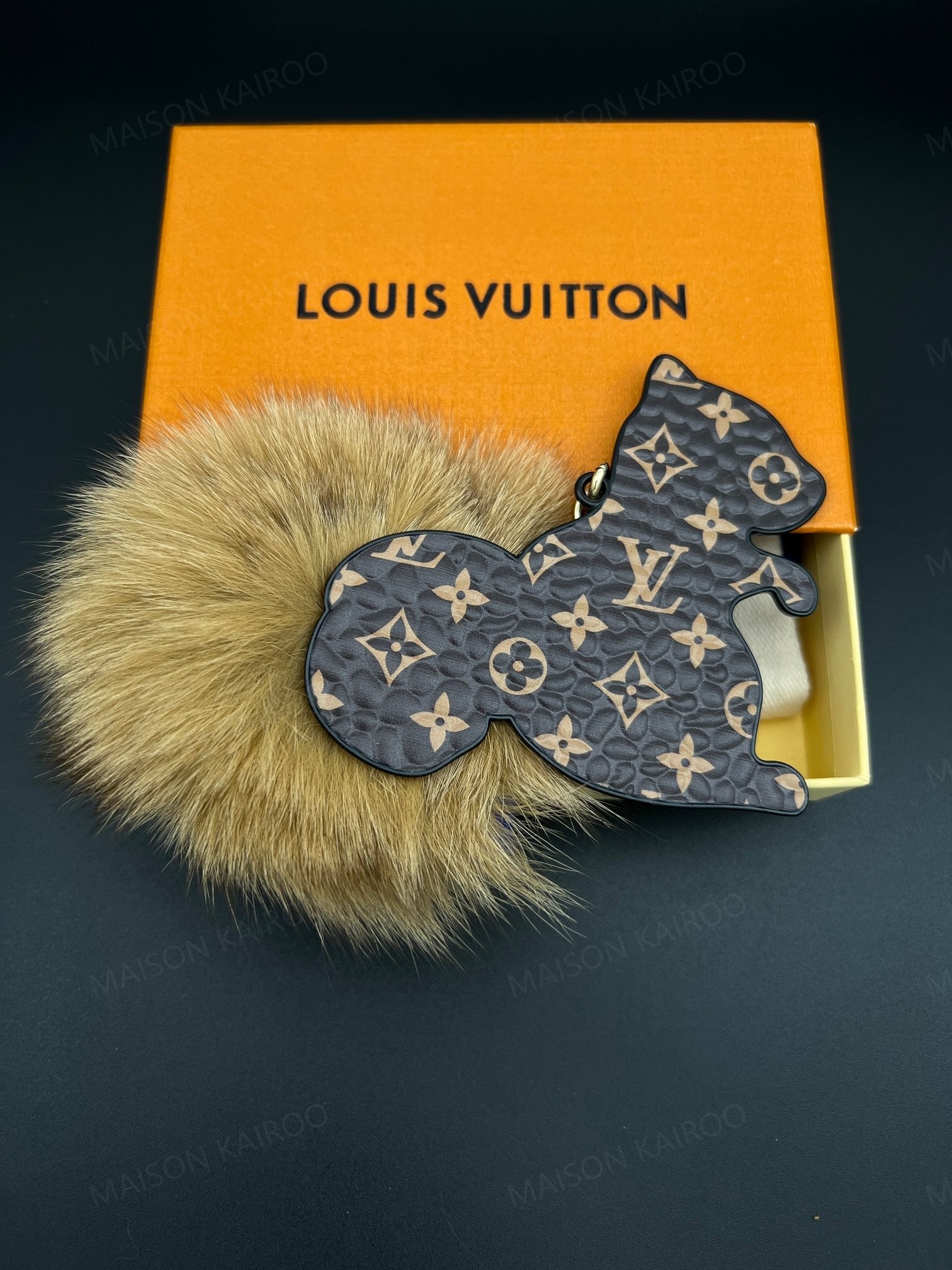 Louis Vuitton LV Monogram Squirrel Fur Pom Pom Bag Charm Keychain - KAIROO