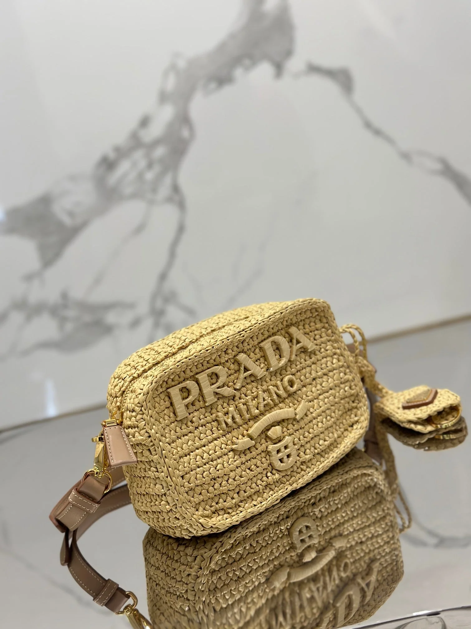 Prada CAMERA BAG 20 IN BEIGE WOVEN RAFFIA
