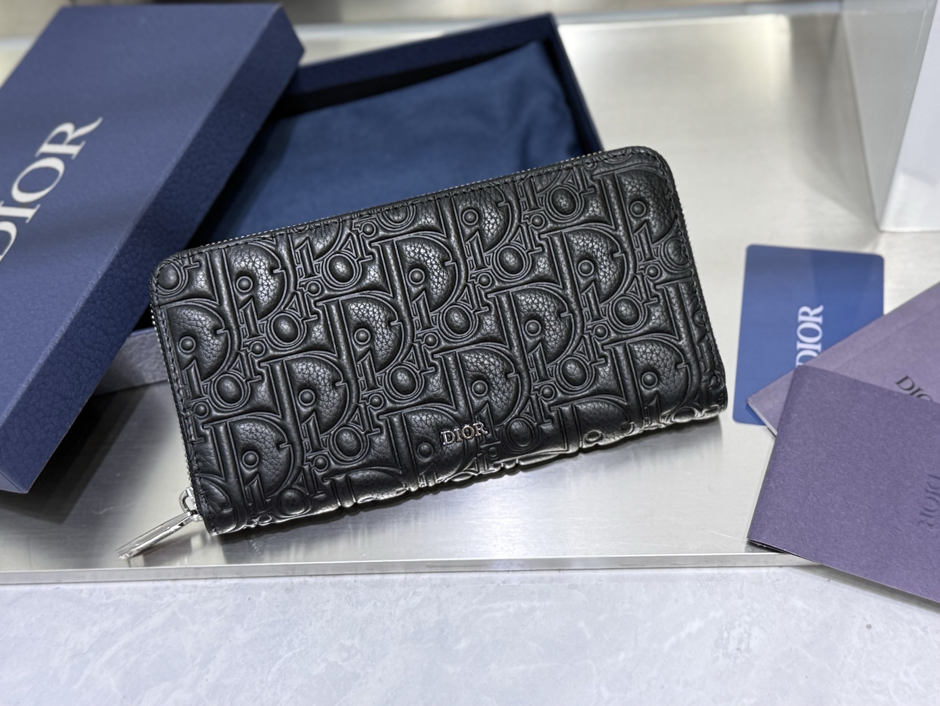 Dior Zip around Wallet in Black embossed leather