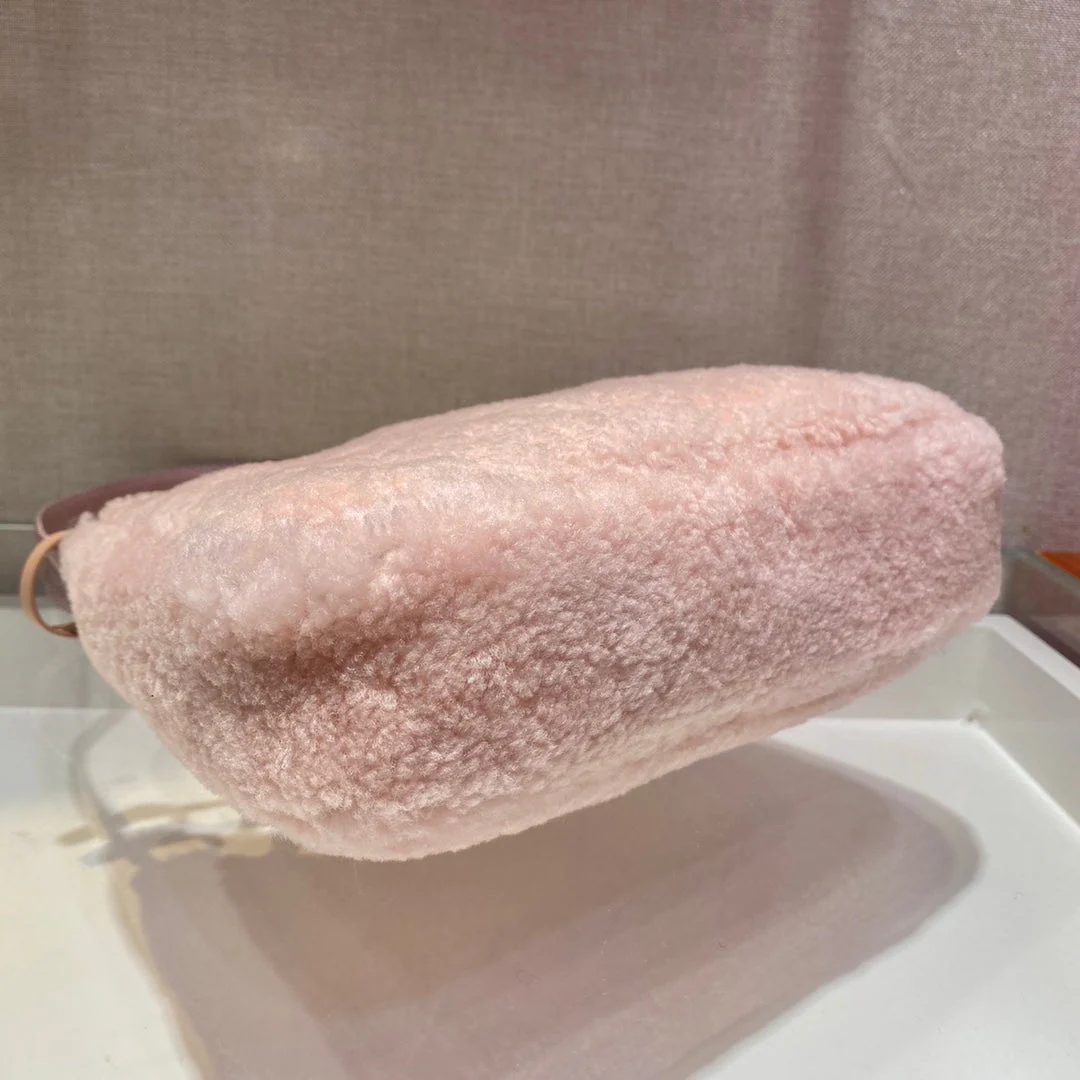 Prada HOBO BAG 23 IN LIGHT PINK SHEARLING