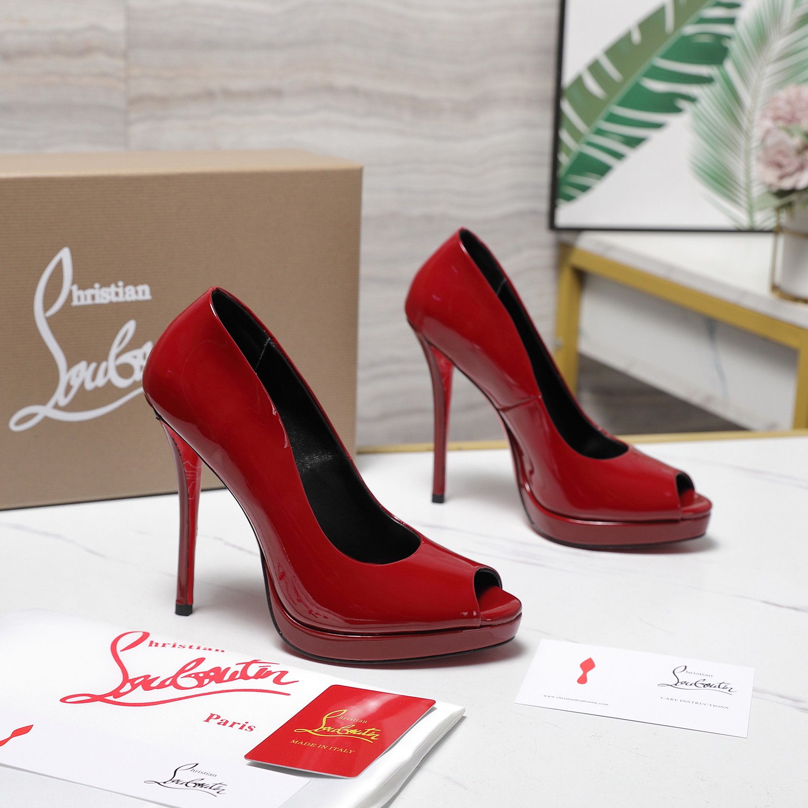 Christian Louboutin Shiny Calfskin Platform Pumps in Red