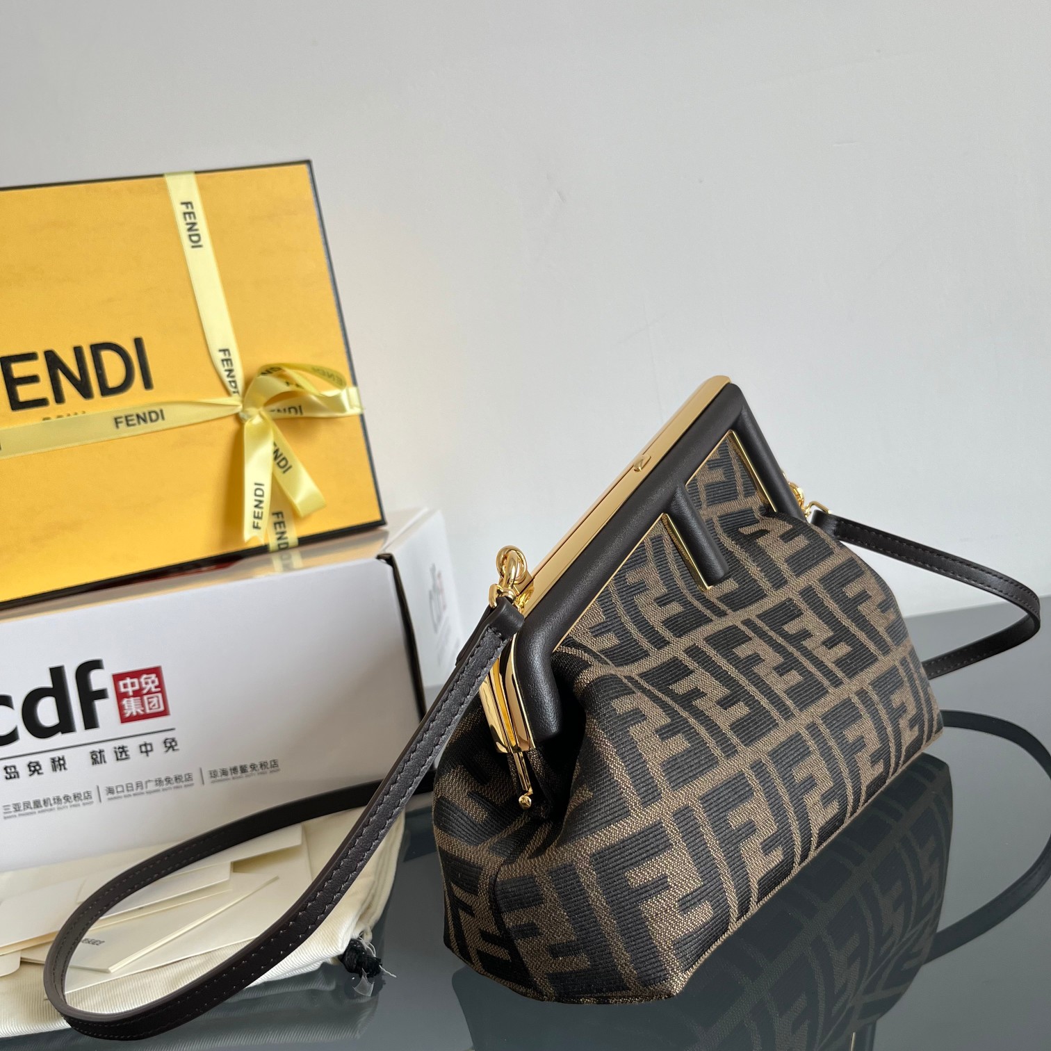 Fendi Small FF Logo Jacquard Canvas First Bag with Gold-Tone F Clasp - KAIROO