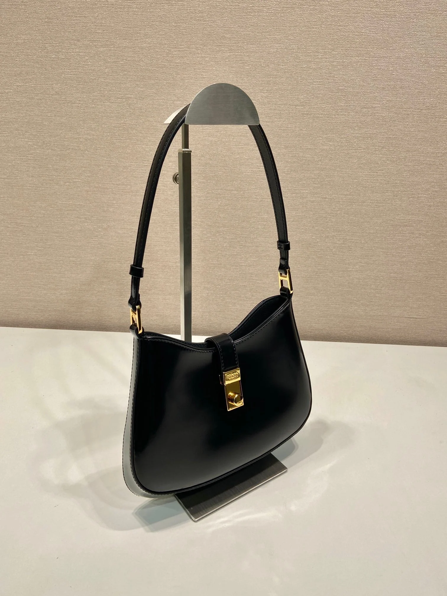 Prada CLEO SHOULDER BAG 22 IN BLACK BRUSHED LAMBSKIN WITH CLASP CLOSURE