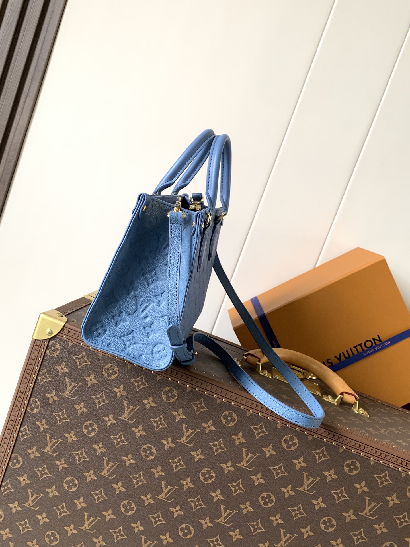 M28181 LV OnTheGo PM Bag in Blue Jean Monogram Empreinte leather
