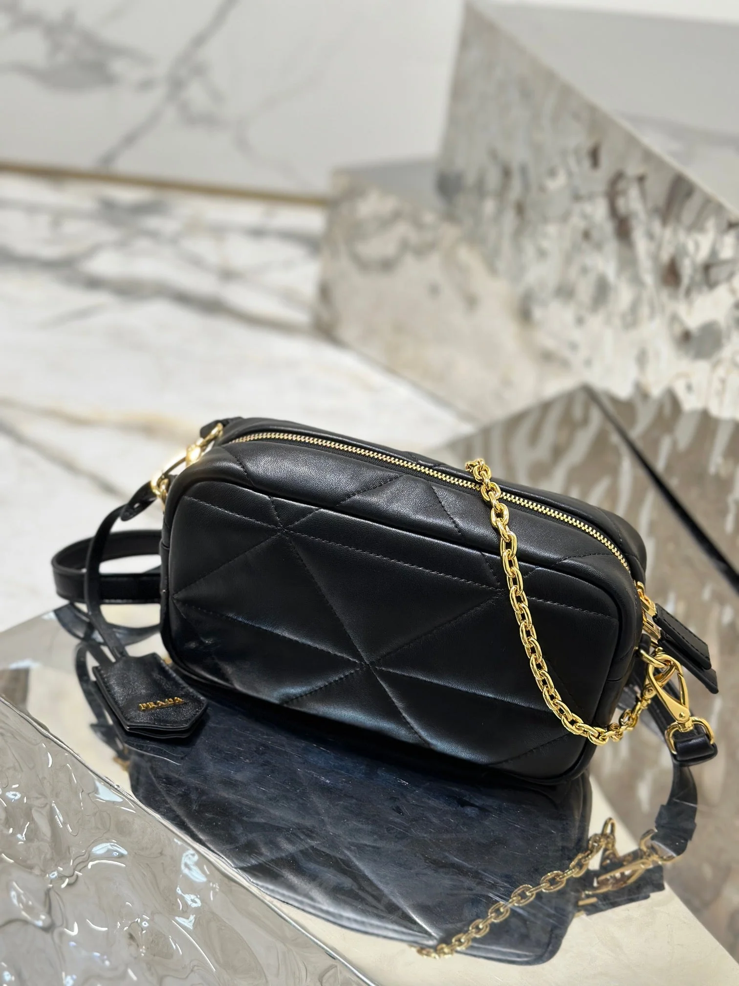 Prada CAMERA BAG 22 IN BLACK TRIANGLE PATTERN QUILTED LAMBSKIN GOLD HARDWARE