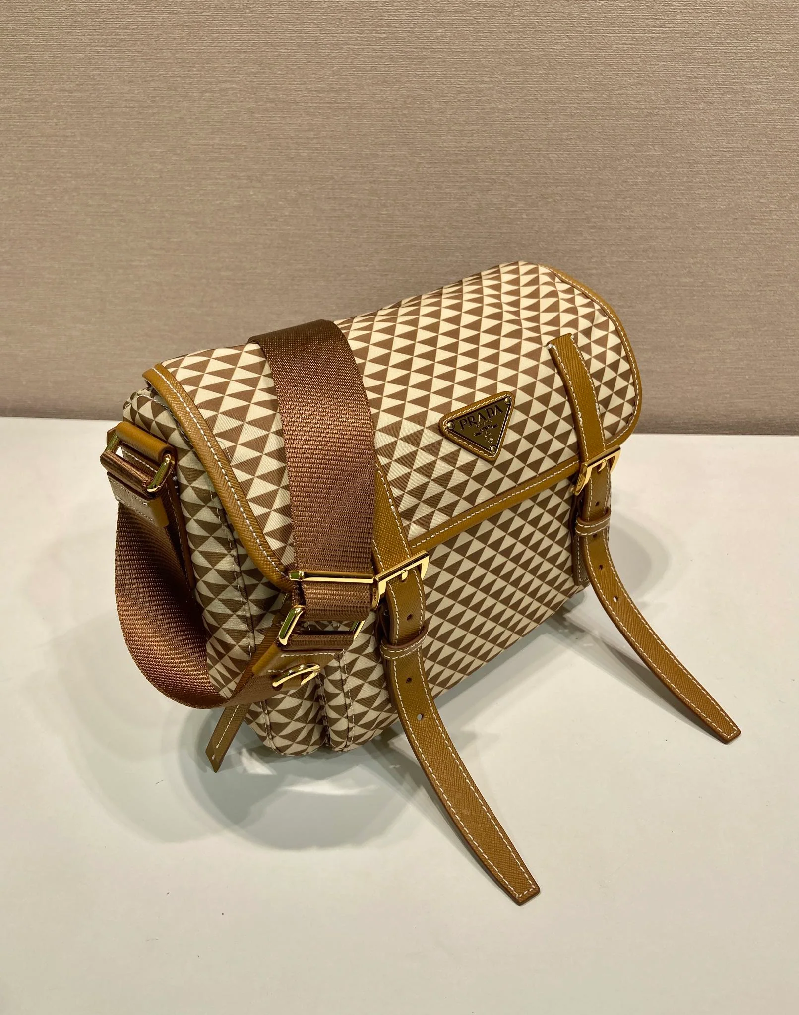 Prada MESSENGER BAG 25 IN BROWN MIX CREAM TRIANGLE PATTERN EMBROIDERED FABRIC