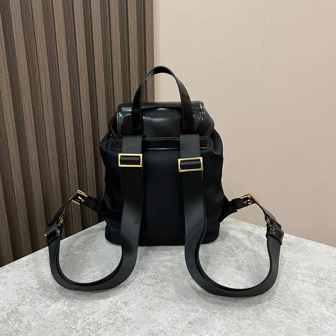Prada BACKPACK 25 IN BLACK RE-NYLON AND GLOSSY CALFSKIN GOLD HARDWARE