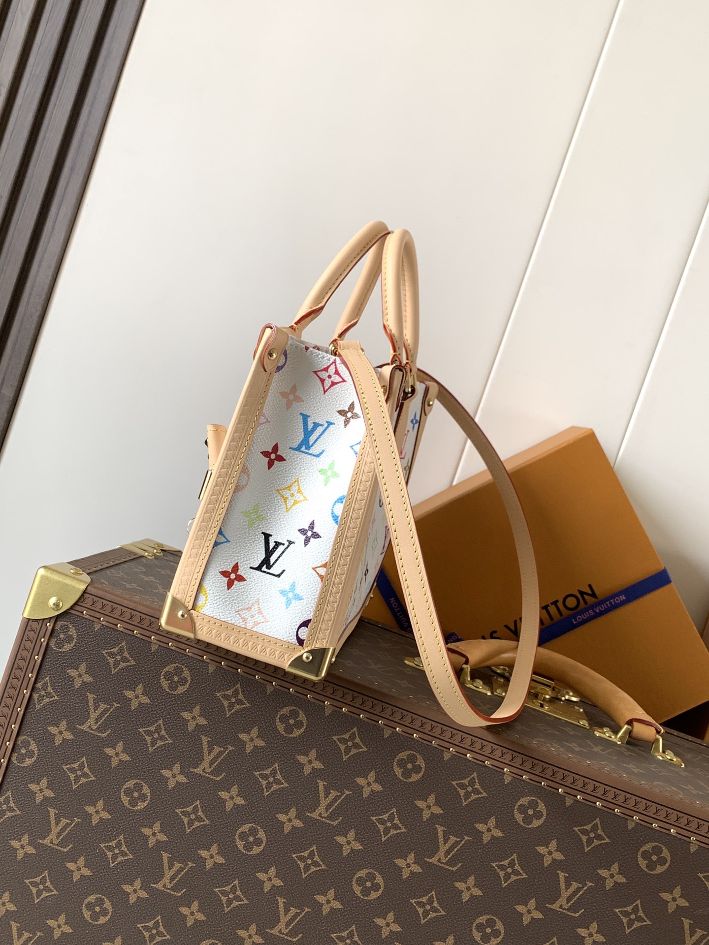 M27580 LV x TM Onthego PM Bag in White Multicolored Canvas