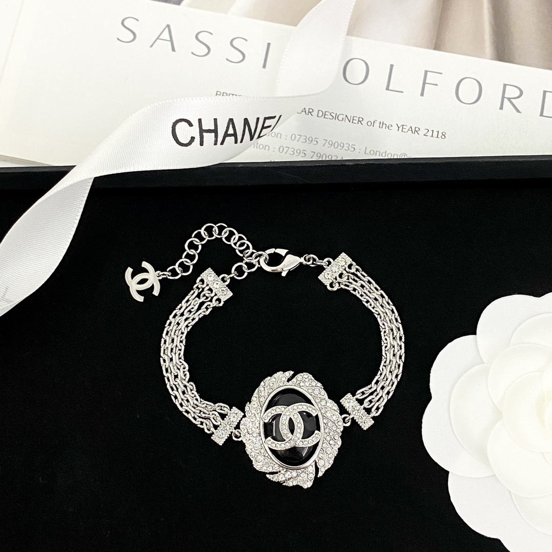 Chanel Silver Crystal Camellia CC Black Enamel Multi-Chain Charm Bracelet - KAIROO