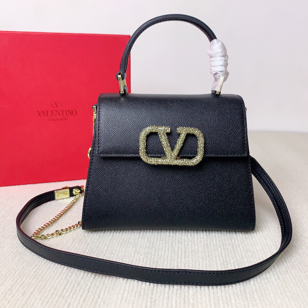Valentino Garavani Vsling Top Handle bag in Calfskin and crystals-Black