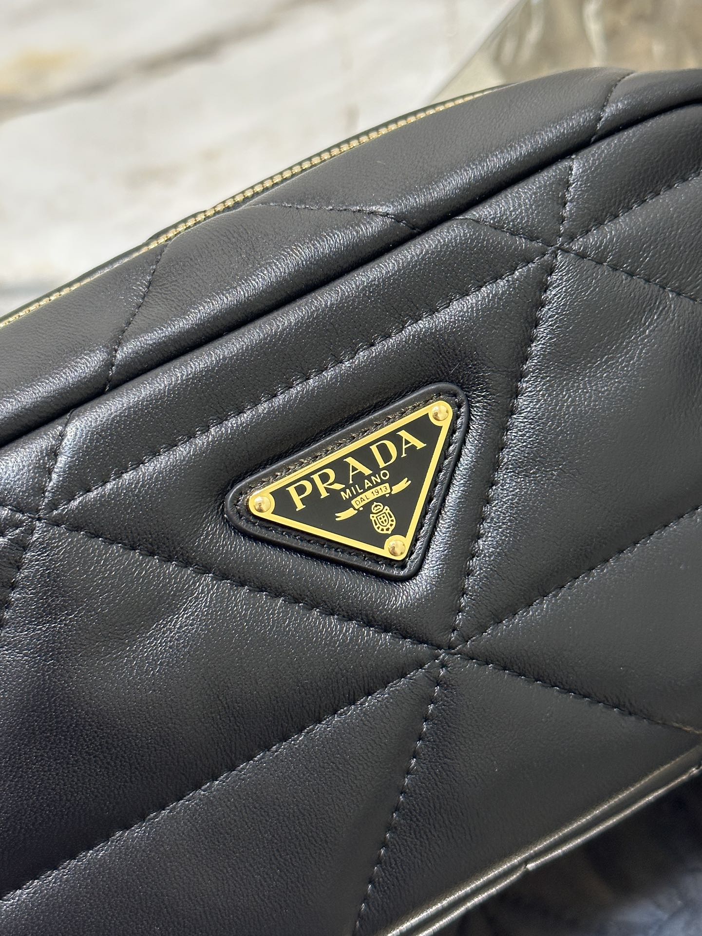 Prada CAMERA BAG 22 IN BLACK TRIANGLE PATTERN QUILTED LAMBSKIN GOLD HARDWARE