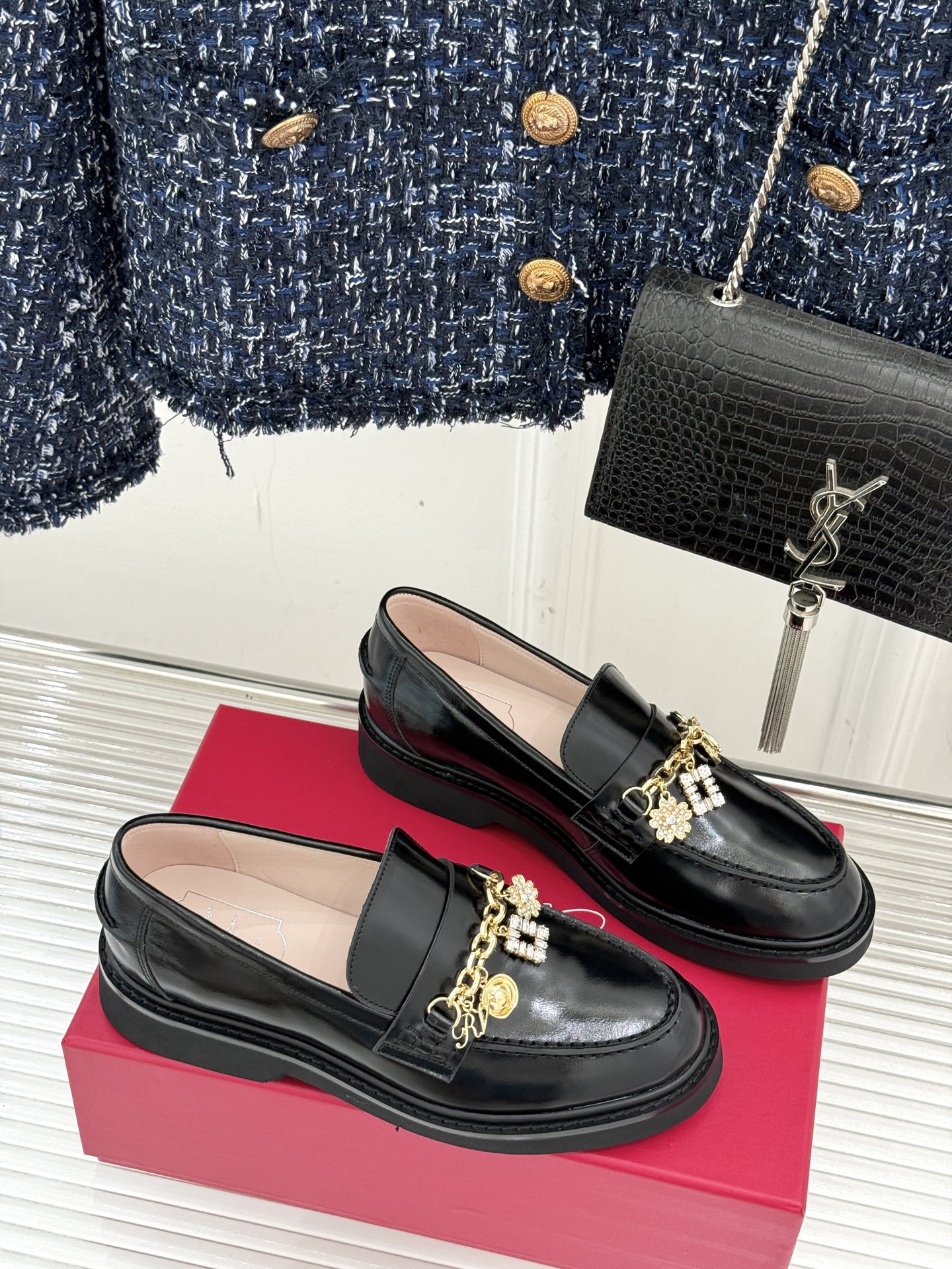 Roger Vivier loafers with rhinestone chain