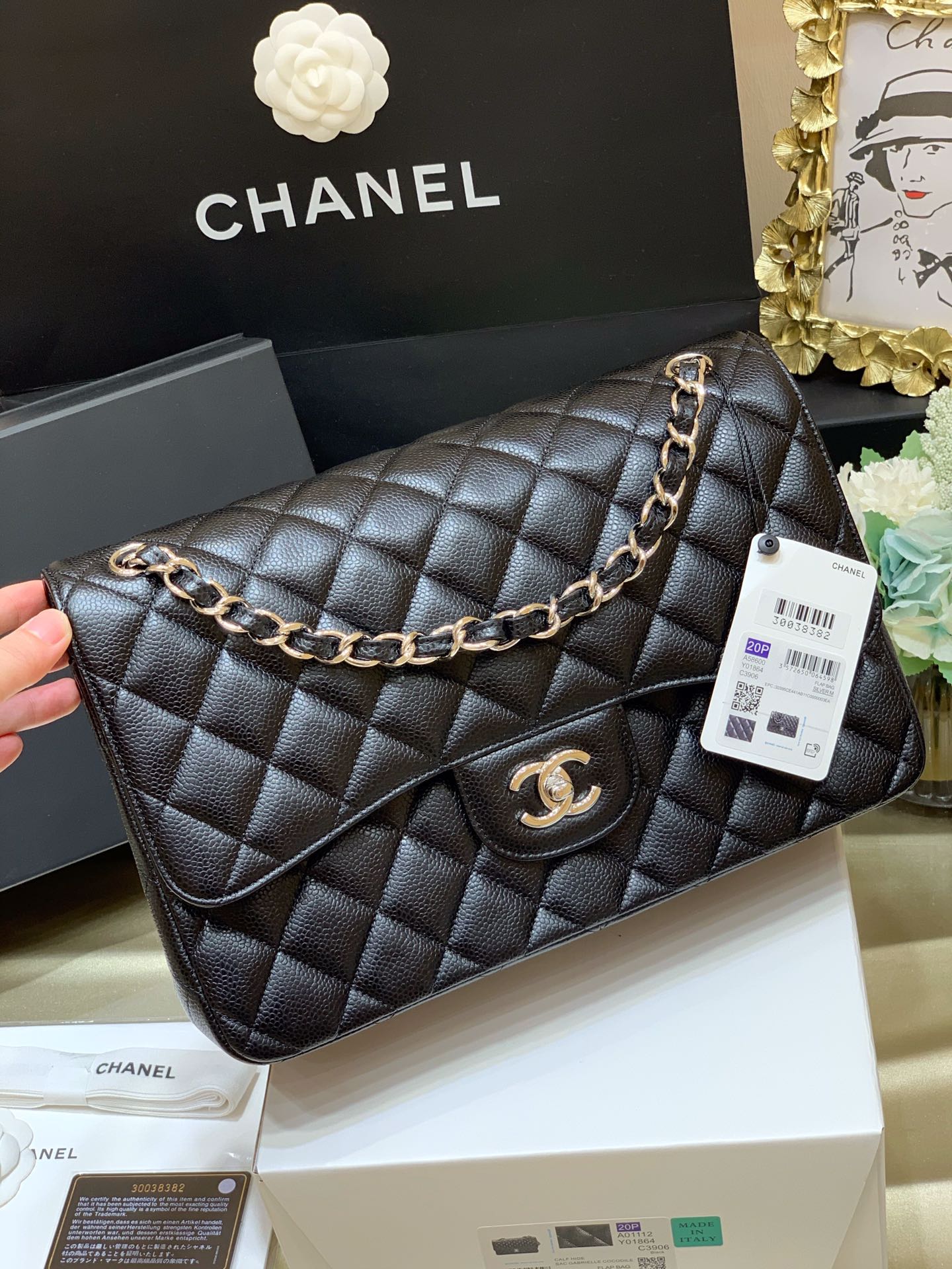 Chanel Large Classic Handbag in Black Caviar leather