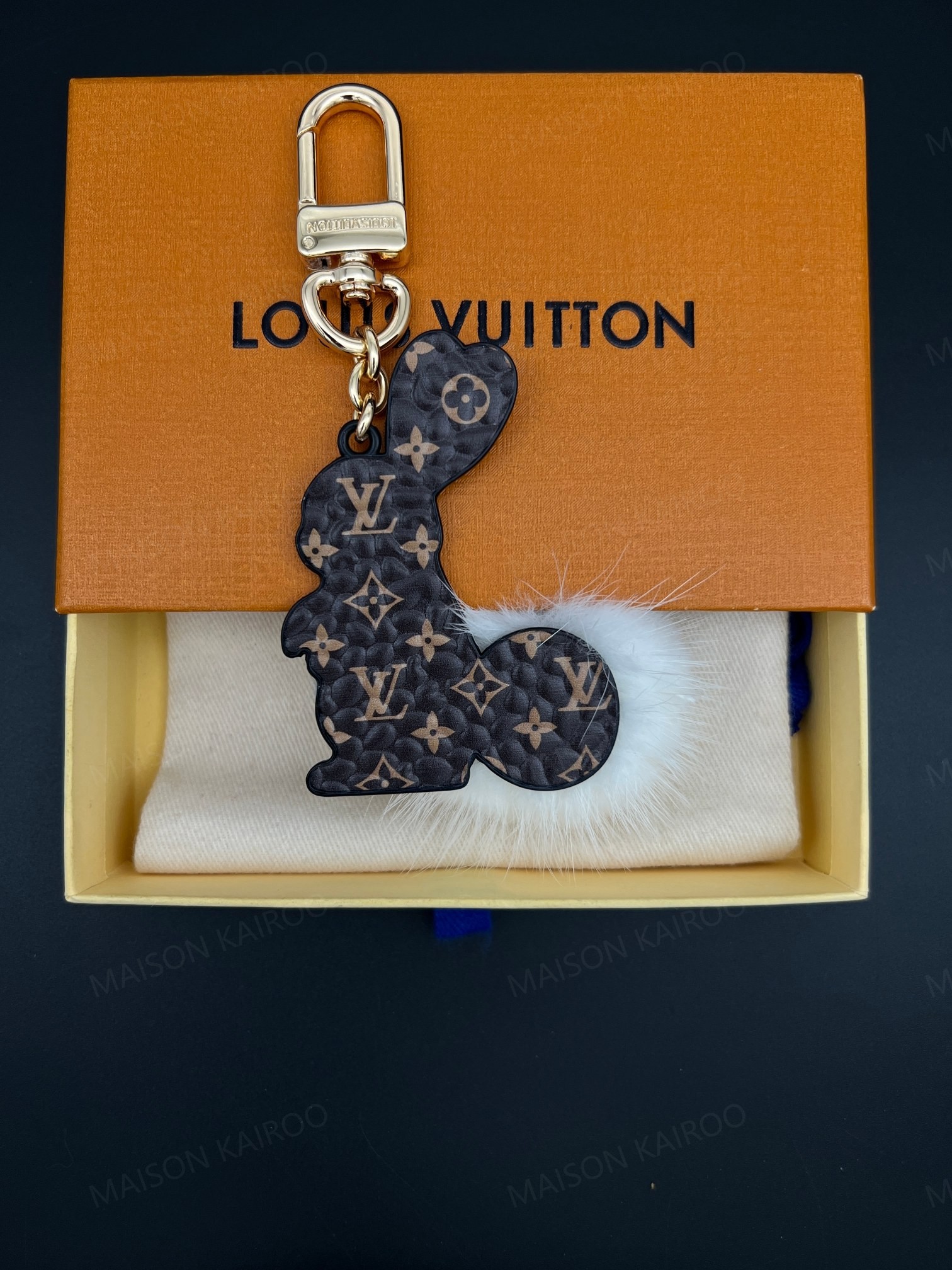 Louis Vuitton LV White Rabbit Fur Pom Pom Bag Charm Keychain - KAIROO