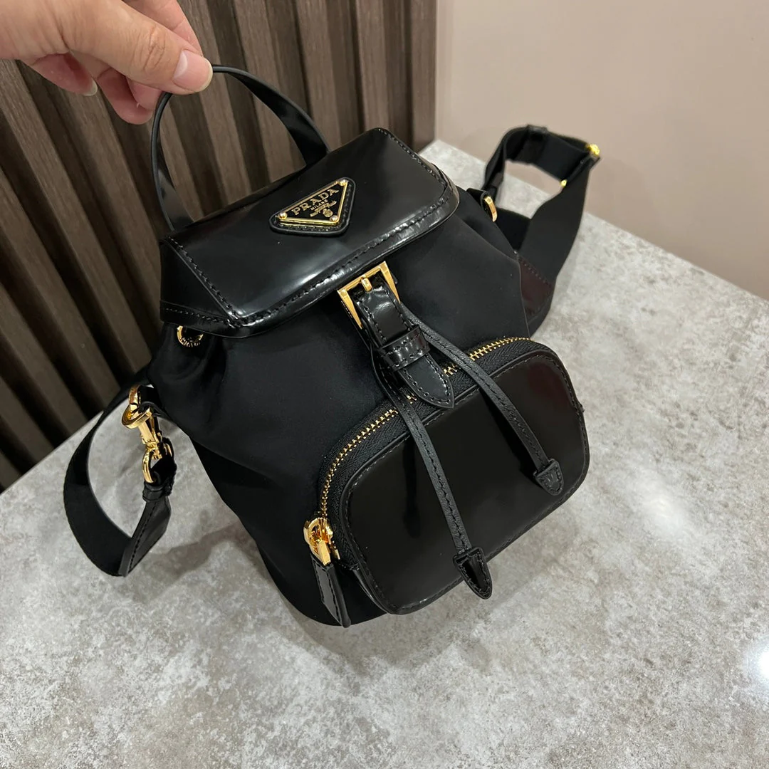 Prada MINI BACKPACK 18 IN BLACK RE-NYLON AND GLOSSY CALFSKIN GOLD HARDWARE