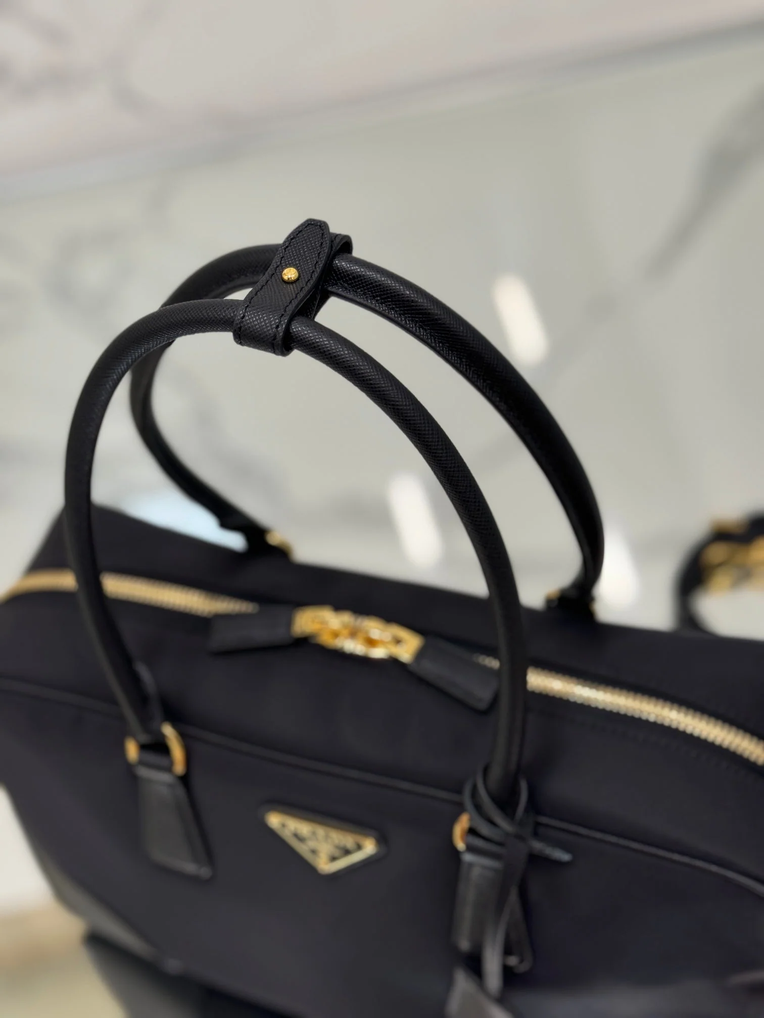 Prada LARGE TOP HANDLE BAG 35 IN BLACK NYLON AND CALFSKIN TRIM