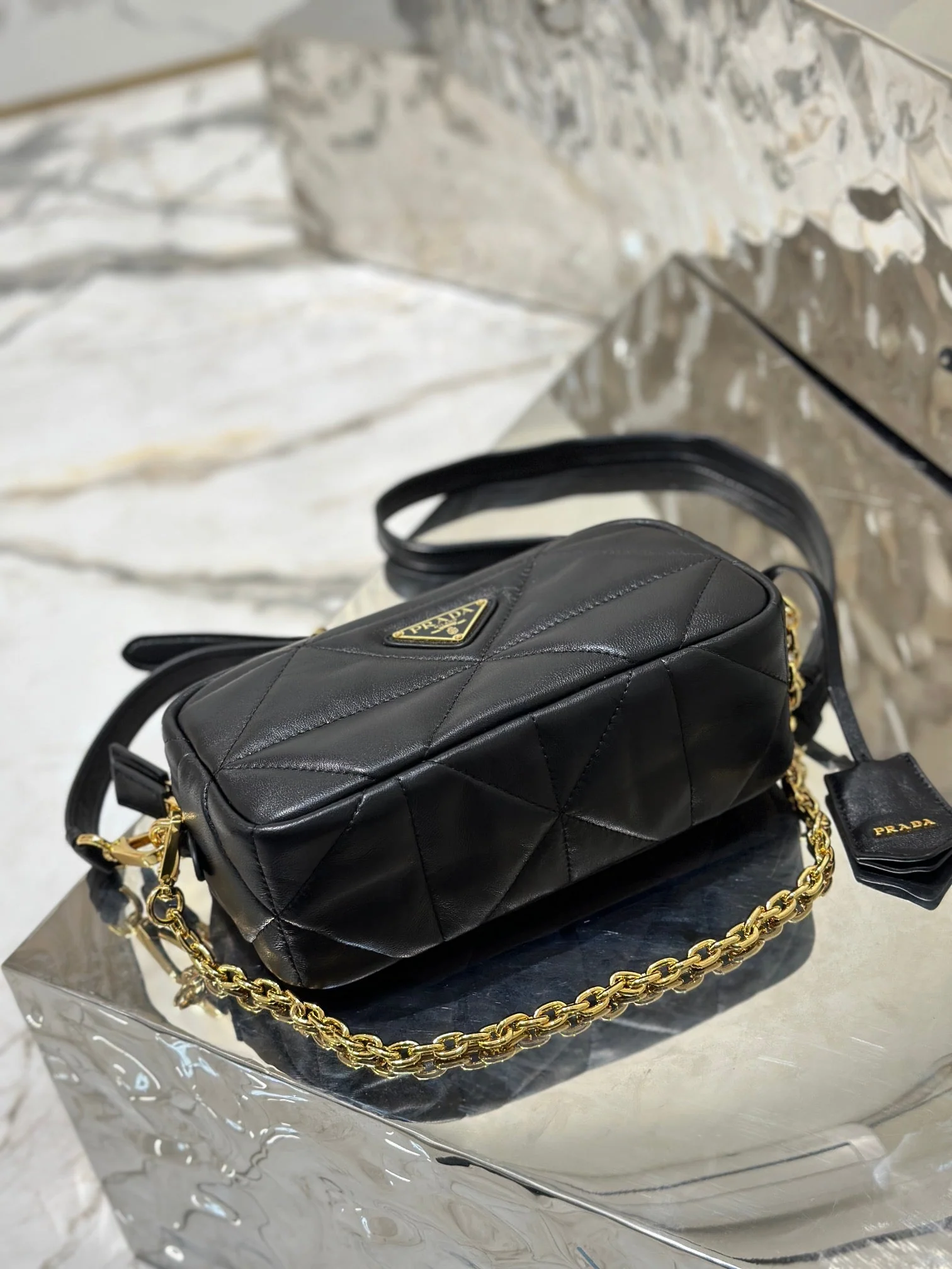 Prada CAMERA BAG 22 IN BLACK TRIANGLE PATTERN QUILTED LAMBSKIN GOLD HARDWARE