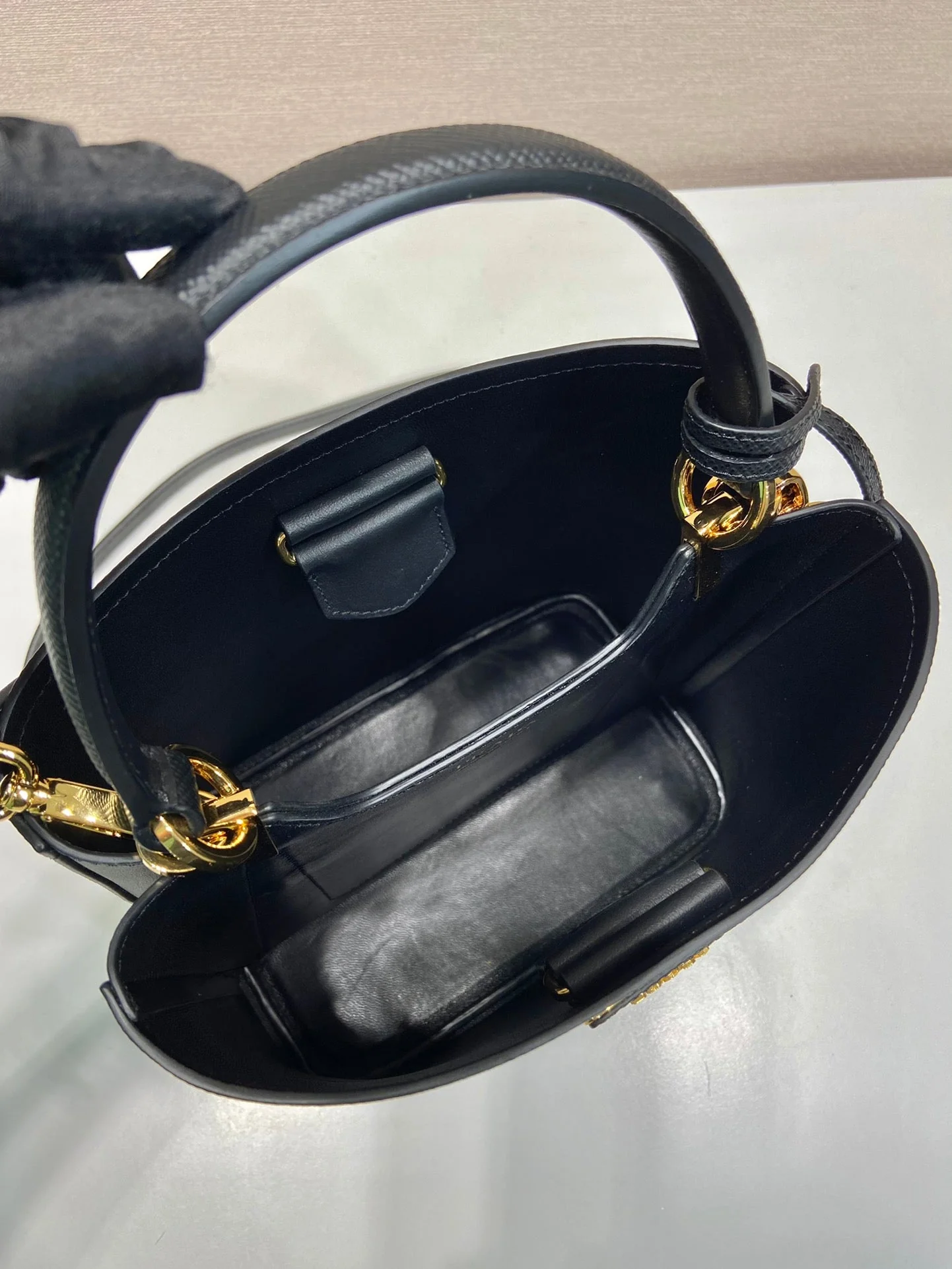 Prada BUCKET BAG 23 IN BLACK SAFFIANO LEATHER