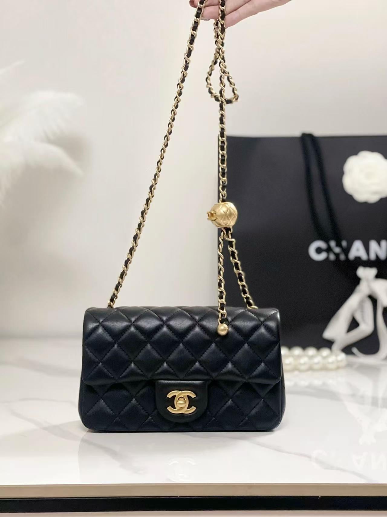 Chanel lambskin small gold ball crossbody bag