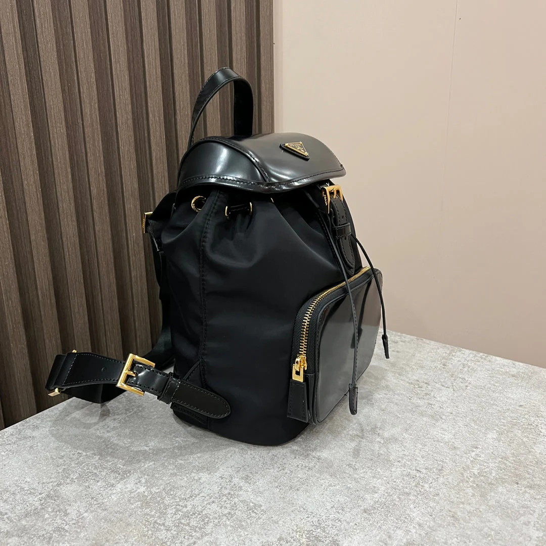 Prada BACKPACK 25 IN BLACK RE-NYLON AND GLOSSY CALFSKIN GOLD HARDWARE